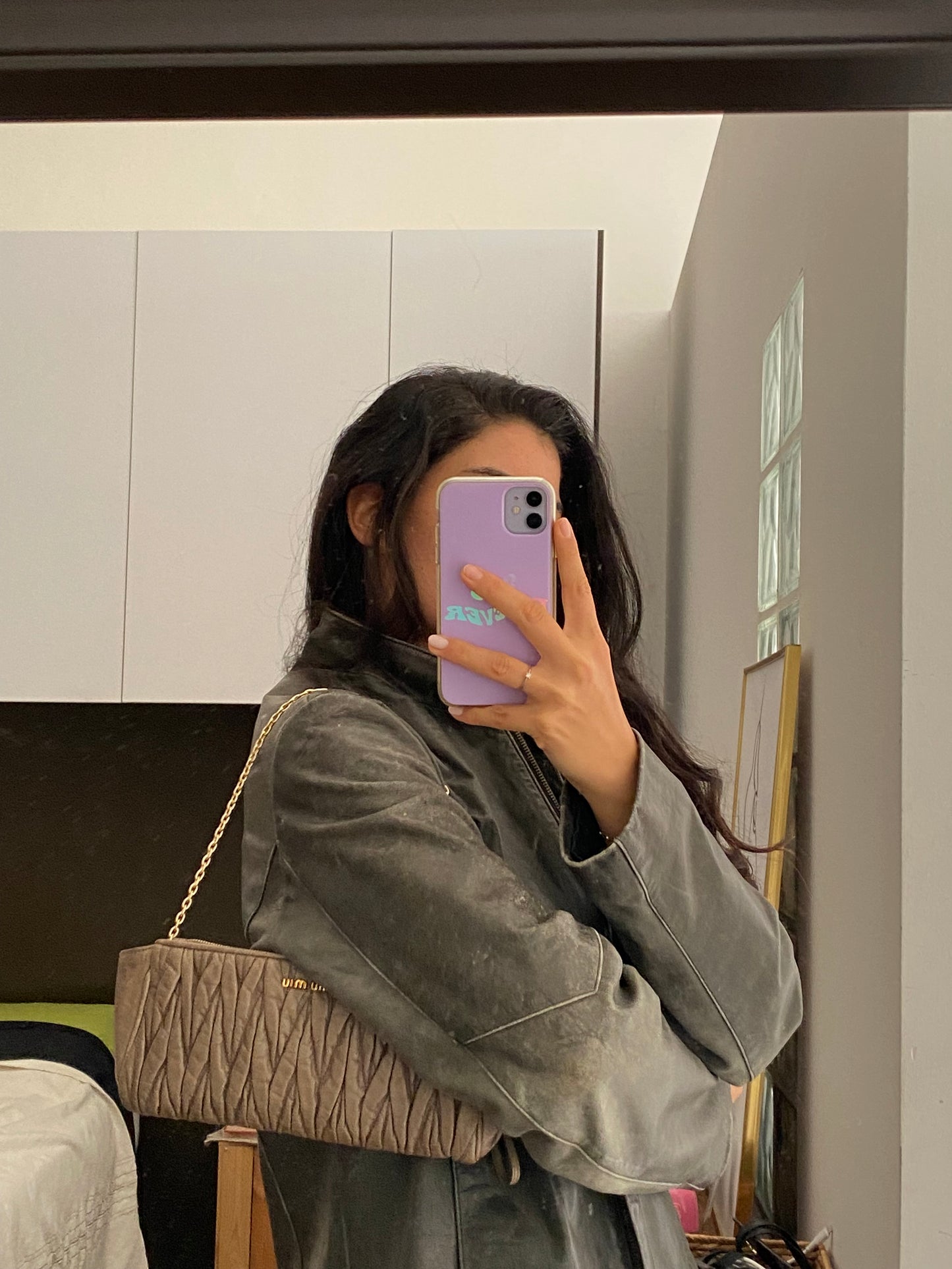 Miu Miu pochette grigia matelasse