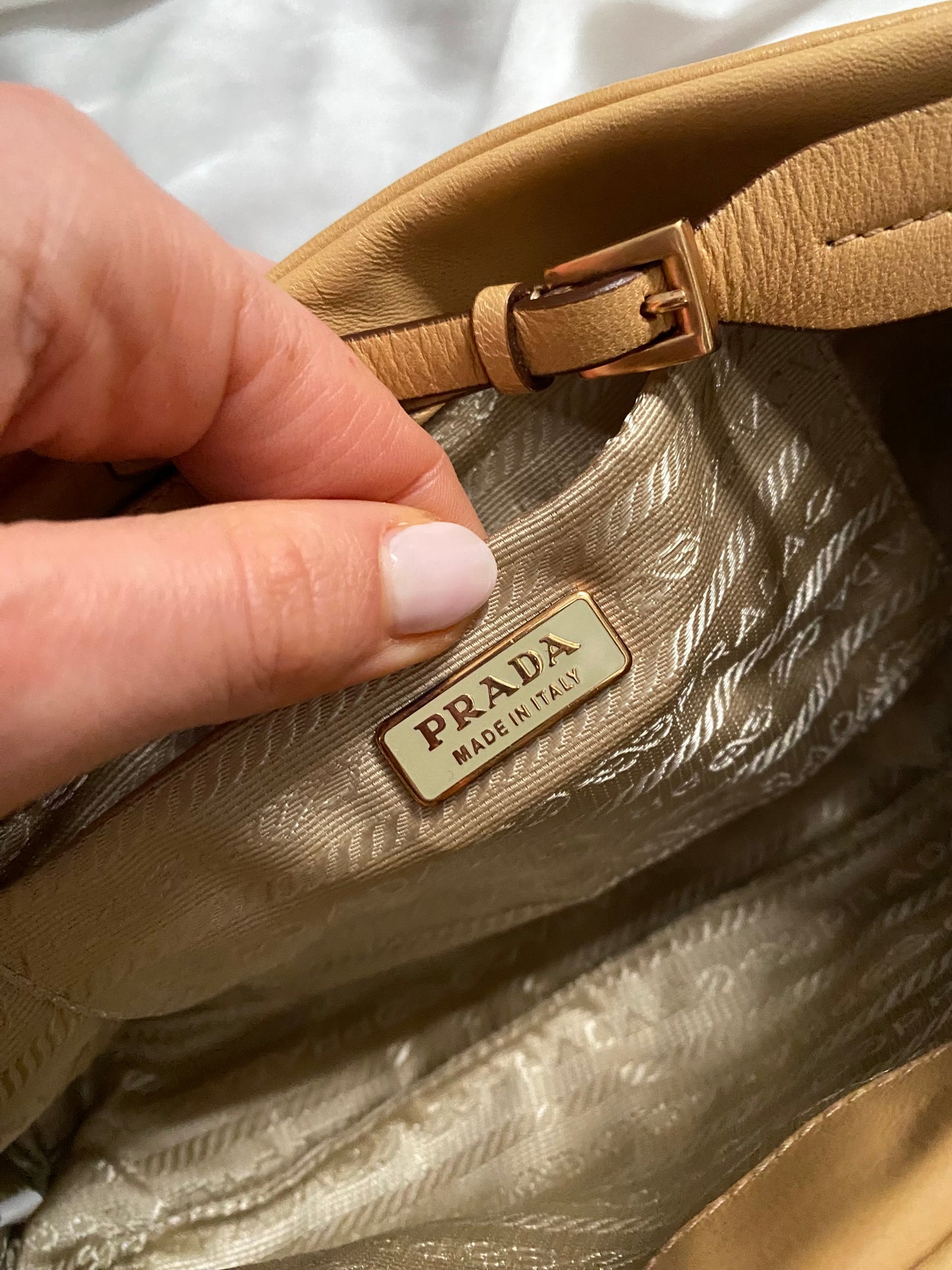 Prada camel clutch bag with studs