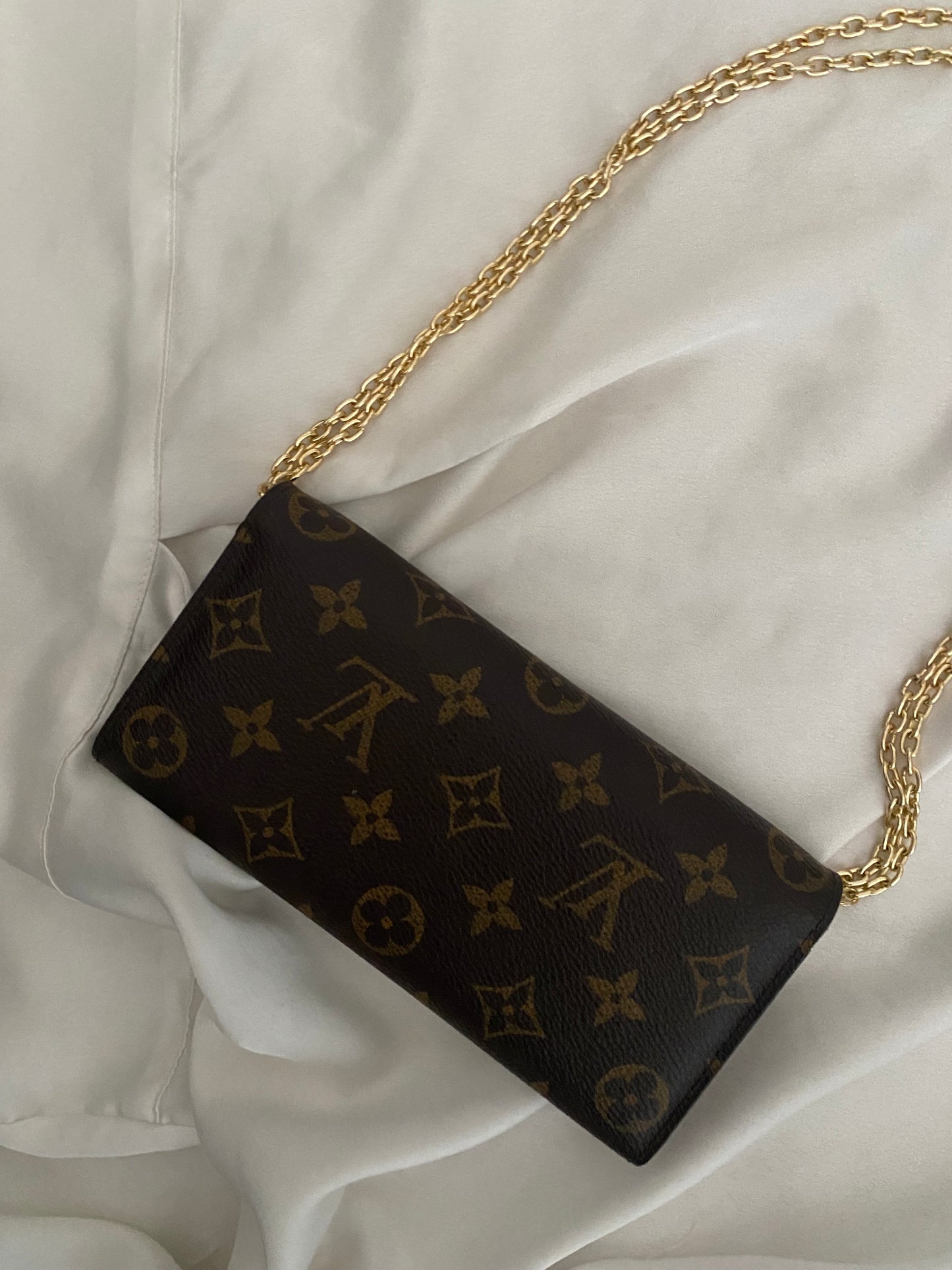 Louis Vuitton Emilie clutch bag with fuchsia interior