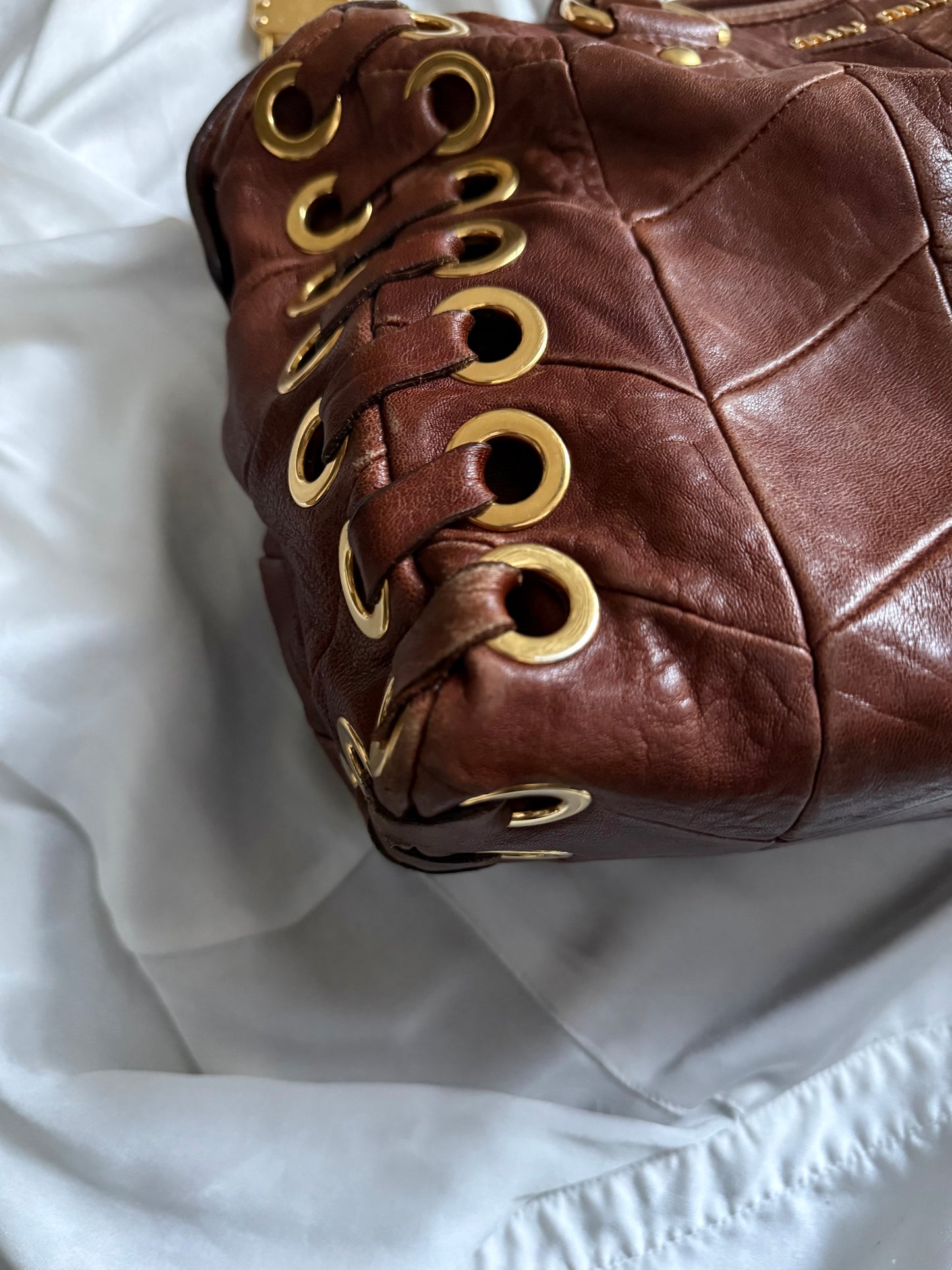 Miu miu grommet misura media