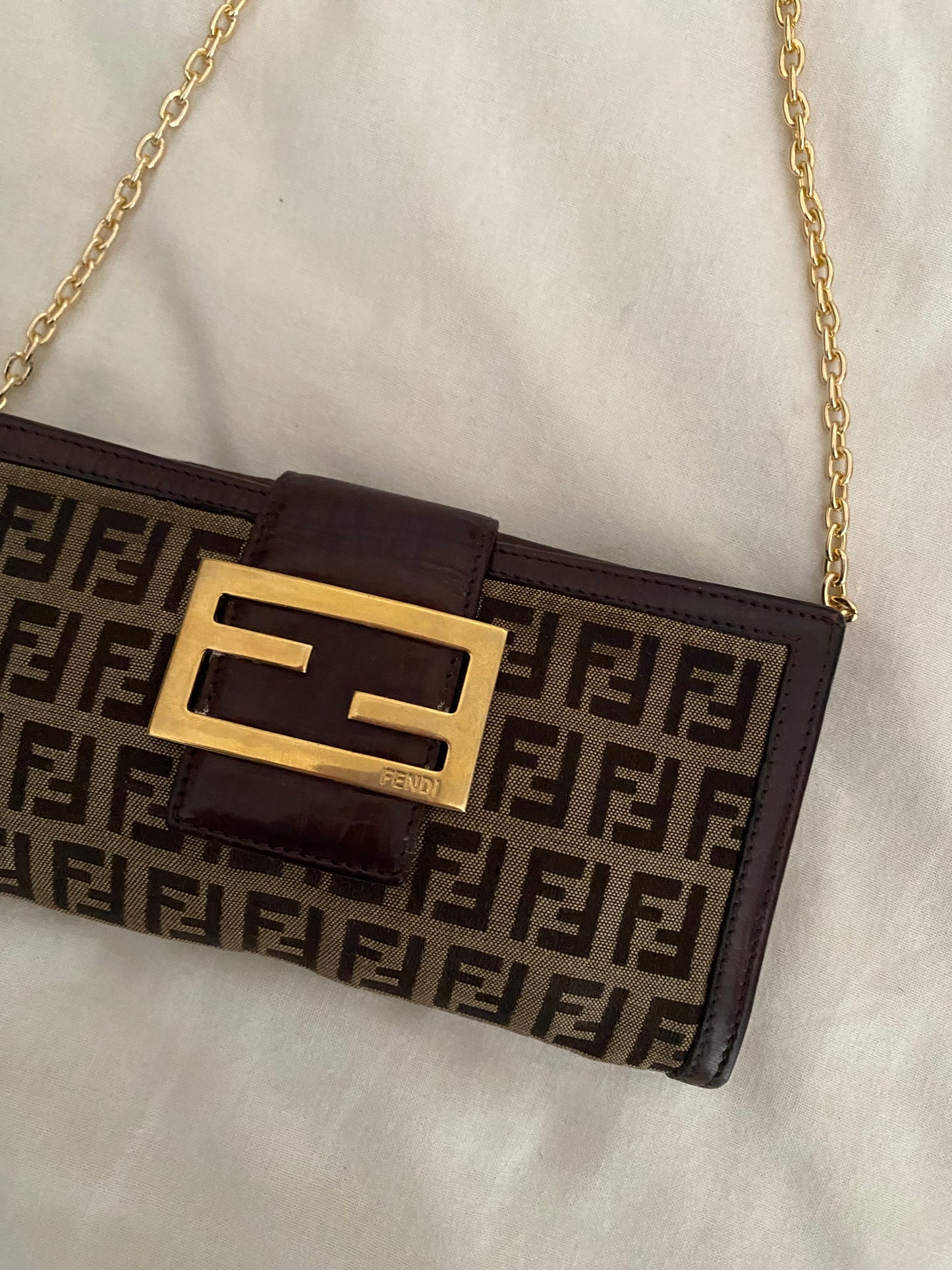 Fendi zucchini clutch bag with maxi logo