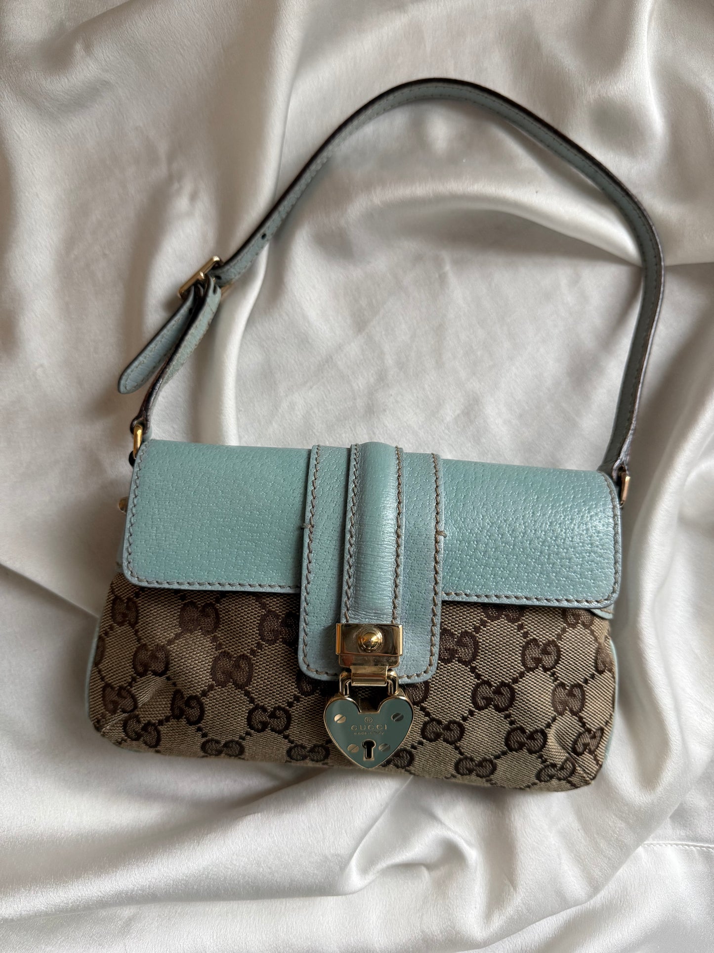 Gucci pochette monogram heartlock light blue