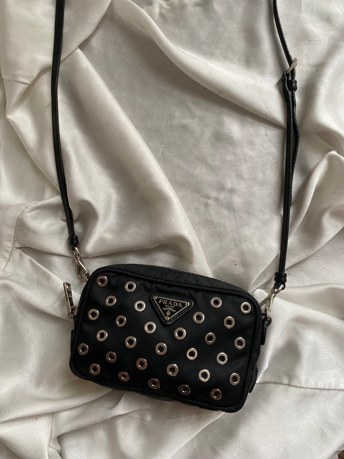 Prada mini grommet
