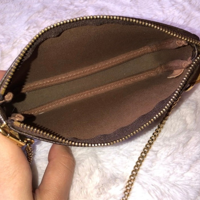 Louis Vuitton mini pochette accessoire monogram excellent condition