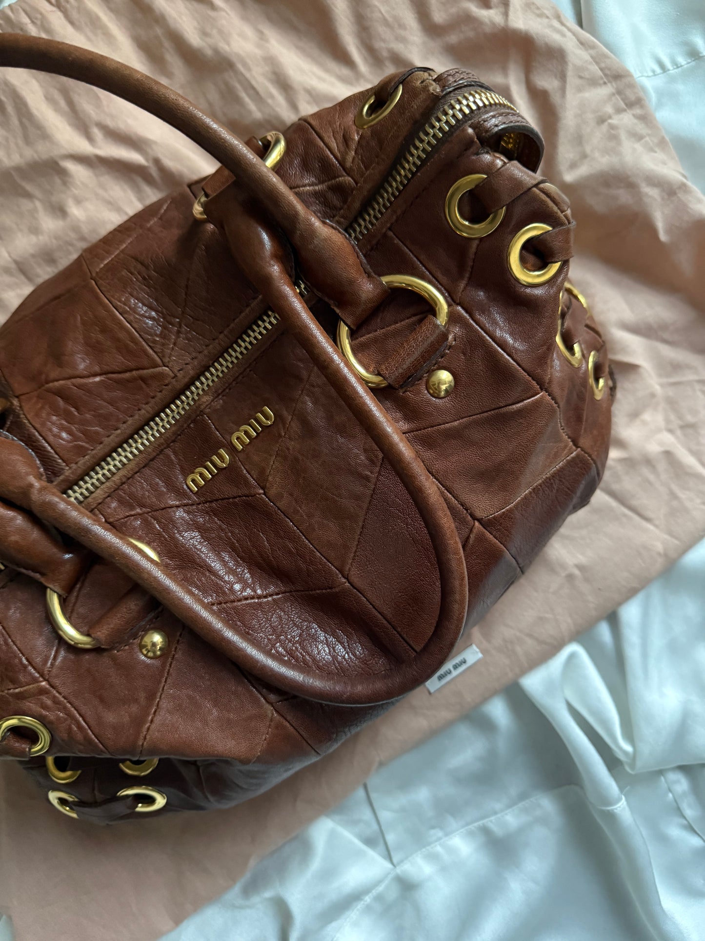 Miu miu grommet misura media