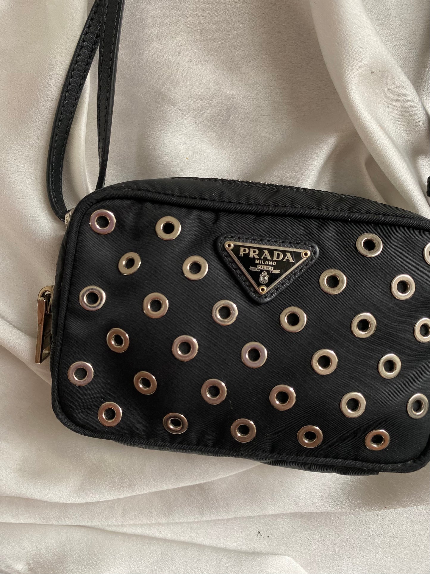 Prada mini grommet