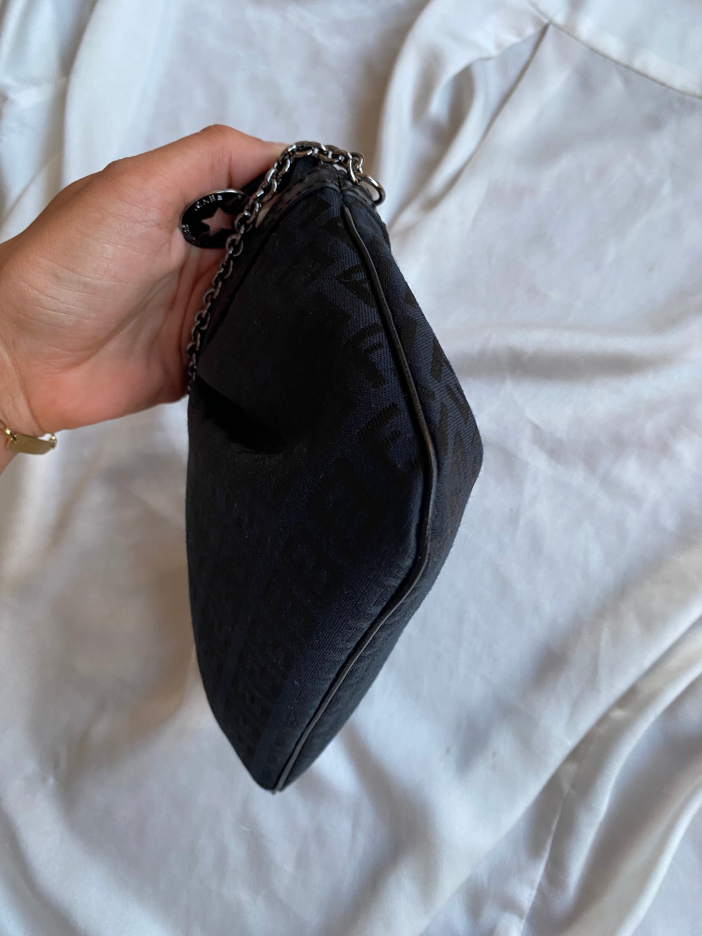 Fendi clutch bag with silver monogram charms and zucchini