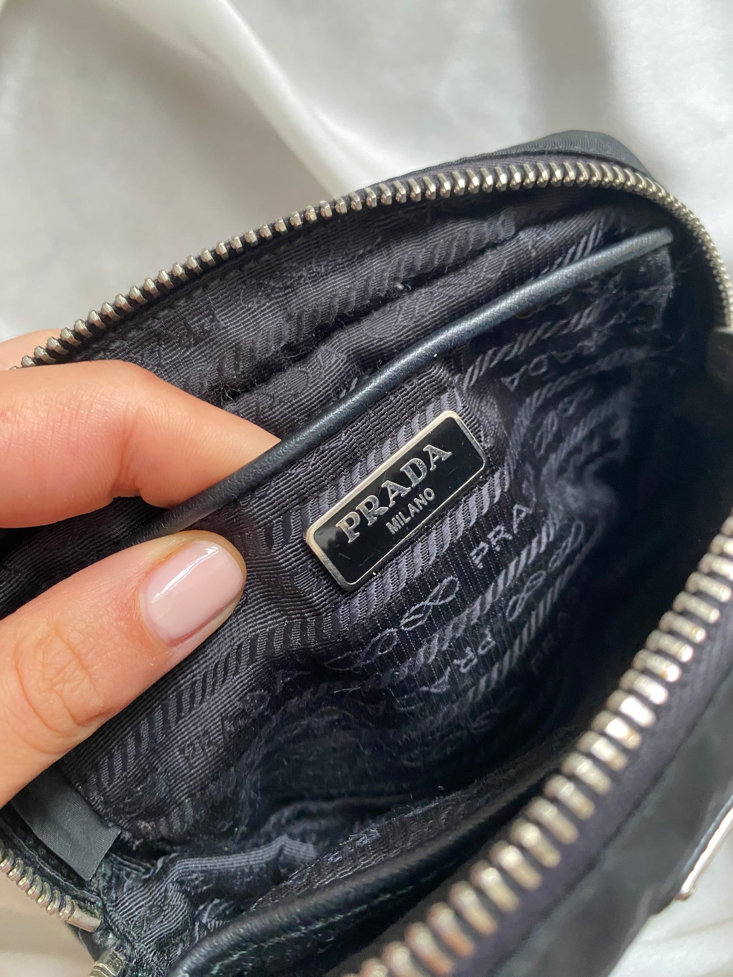Prada mini grommet
