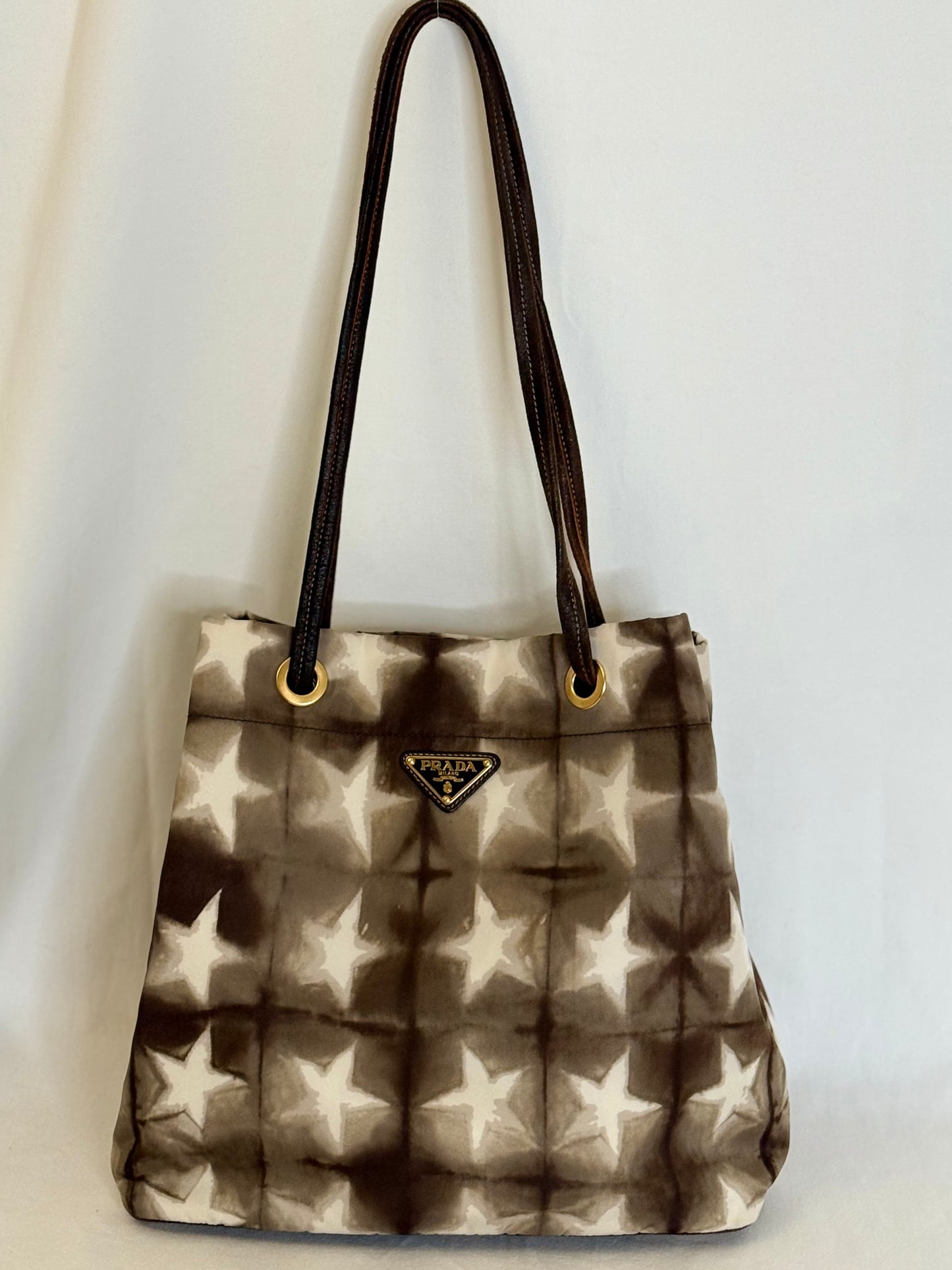 Prada shopping tote stars