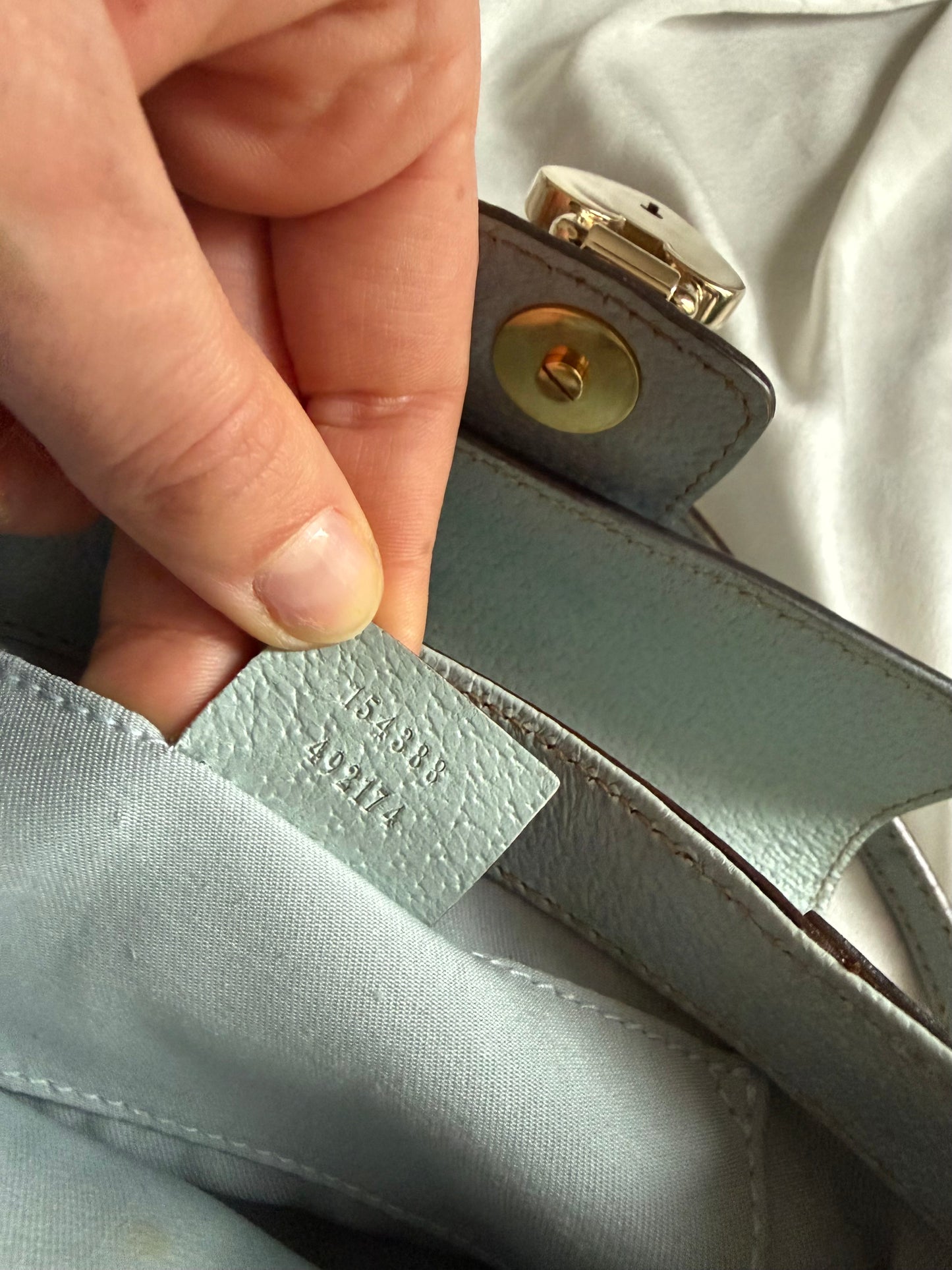 Gucci pochette monogram heartlock light blue