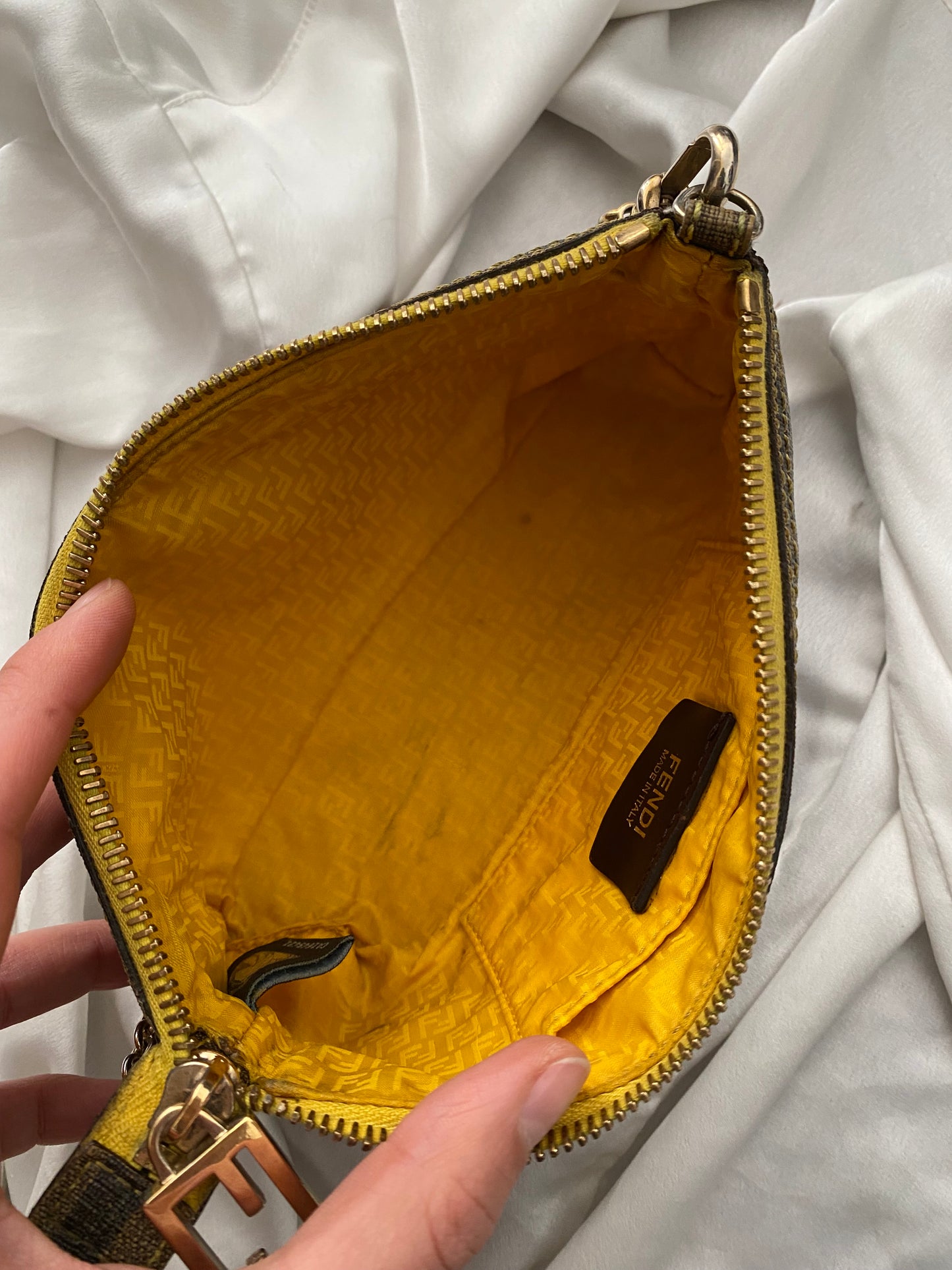 Fendi monogram clutch bag in pumpkin, tobacco, and yellow