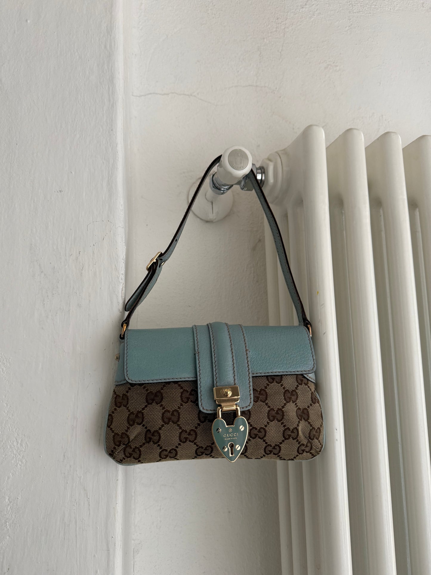 Gucci pochette monogram heartlock light blue