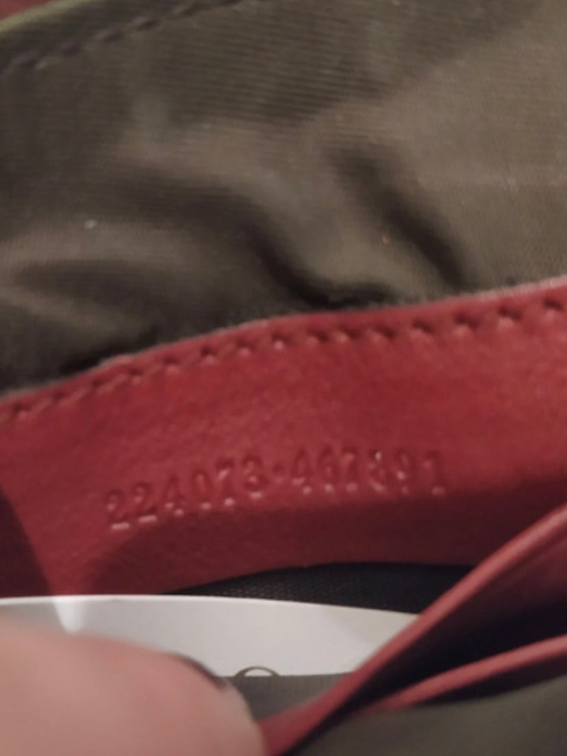 Gucci Monogram burgundy leather clutch bag