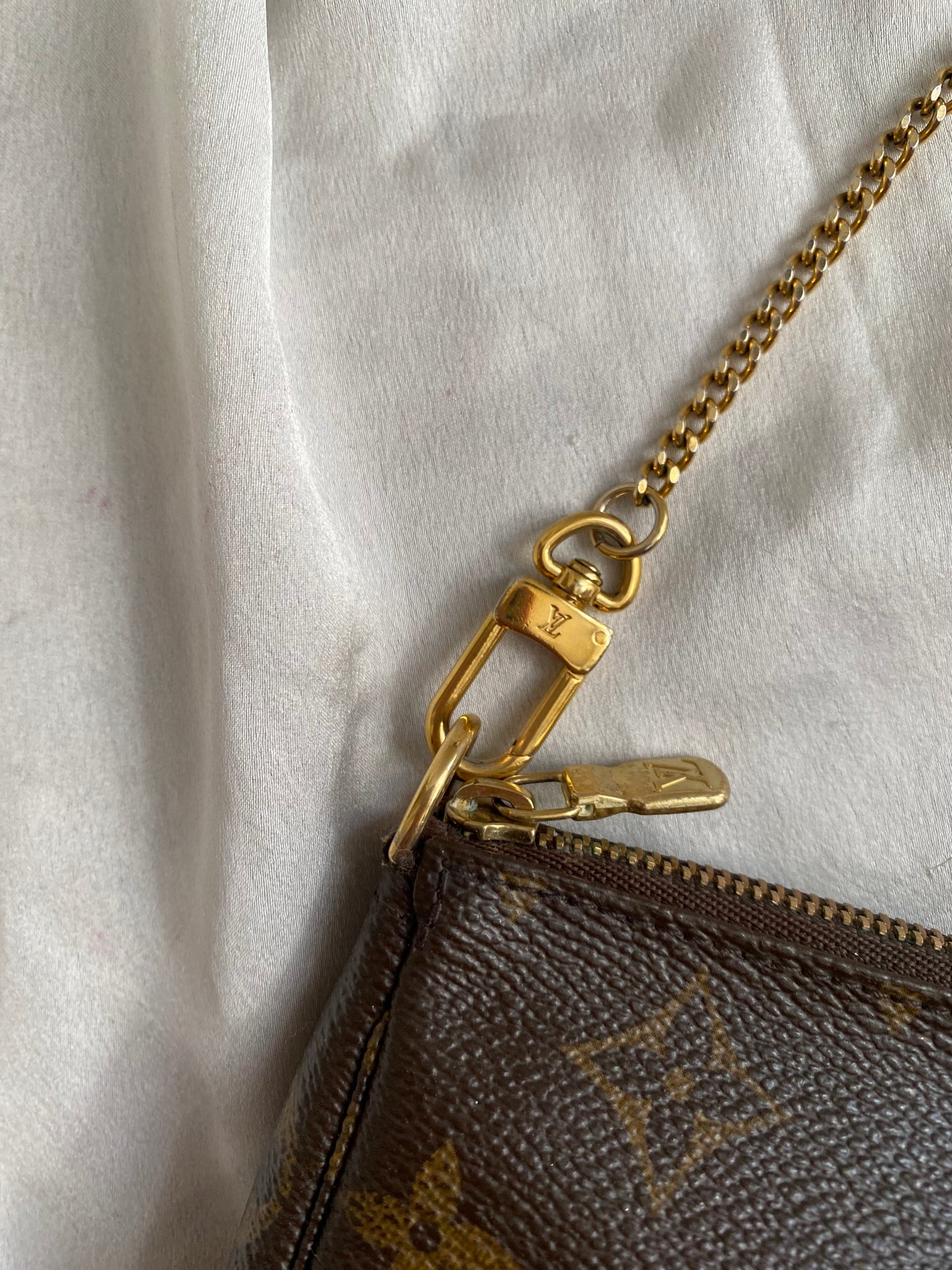 Louis Vuitton mini monogram accessory clutch bag