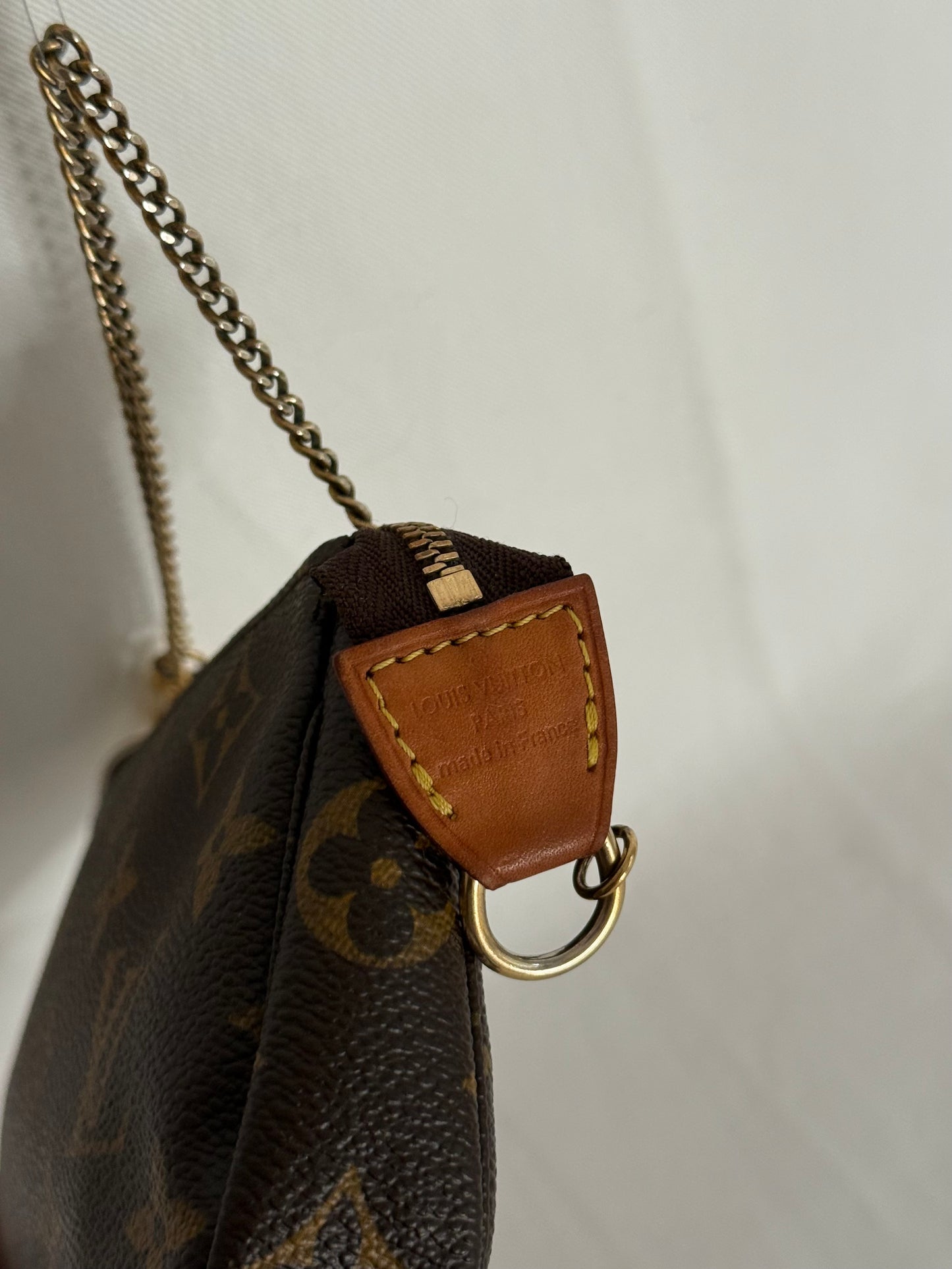 Louis Vuitton mini monogram accessory clutch bag