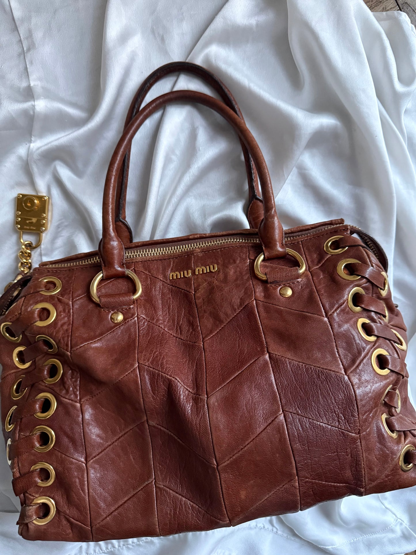 Miu miu grommet misura media