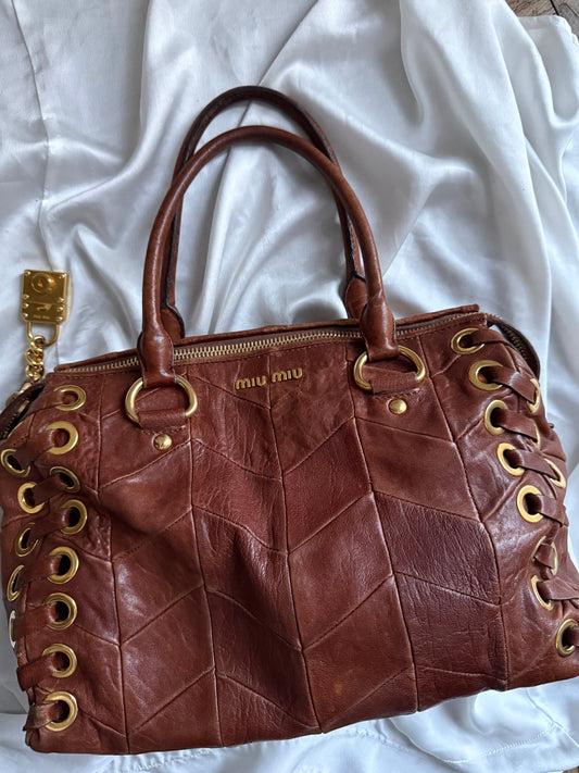 Miu miu grommet misura media