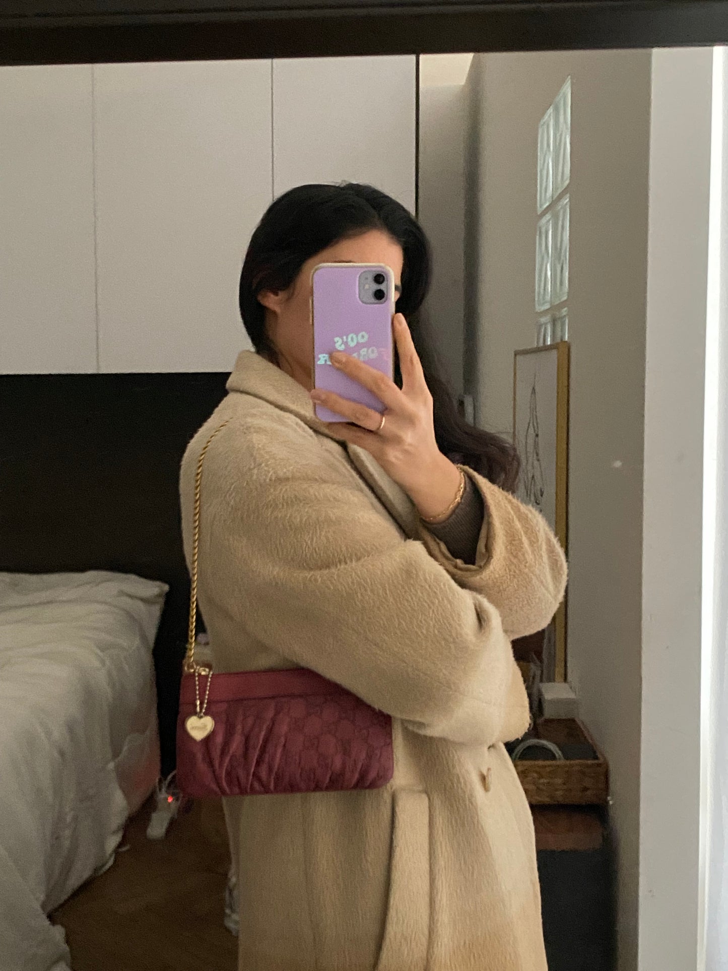 Gucci clutch bag in burgundy with ruby ​​reflections