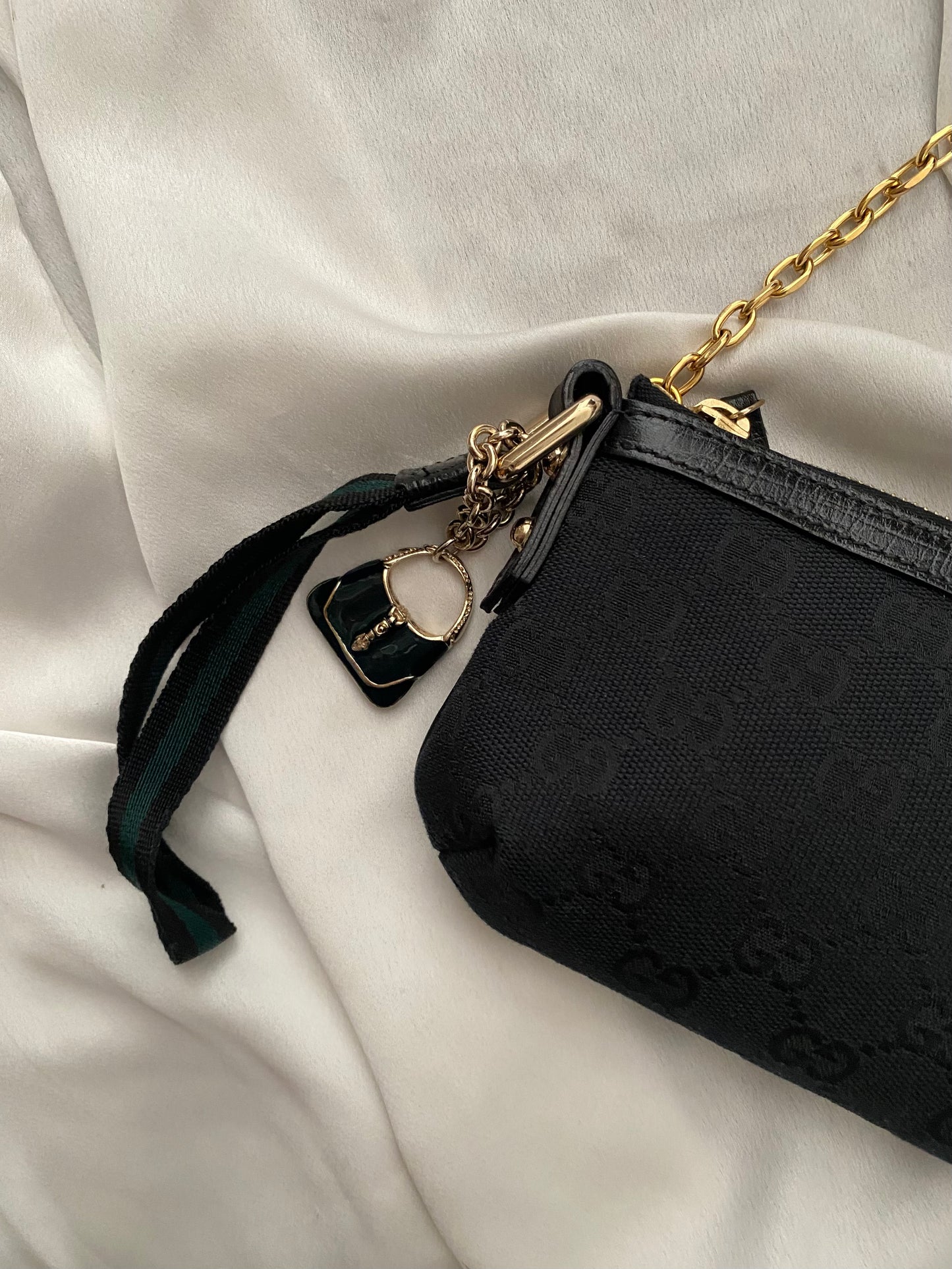 Gucci black monogram web clutch