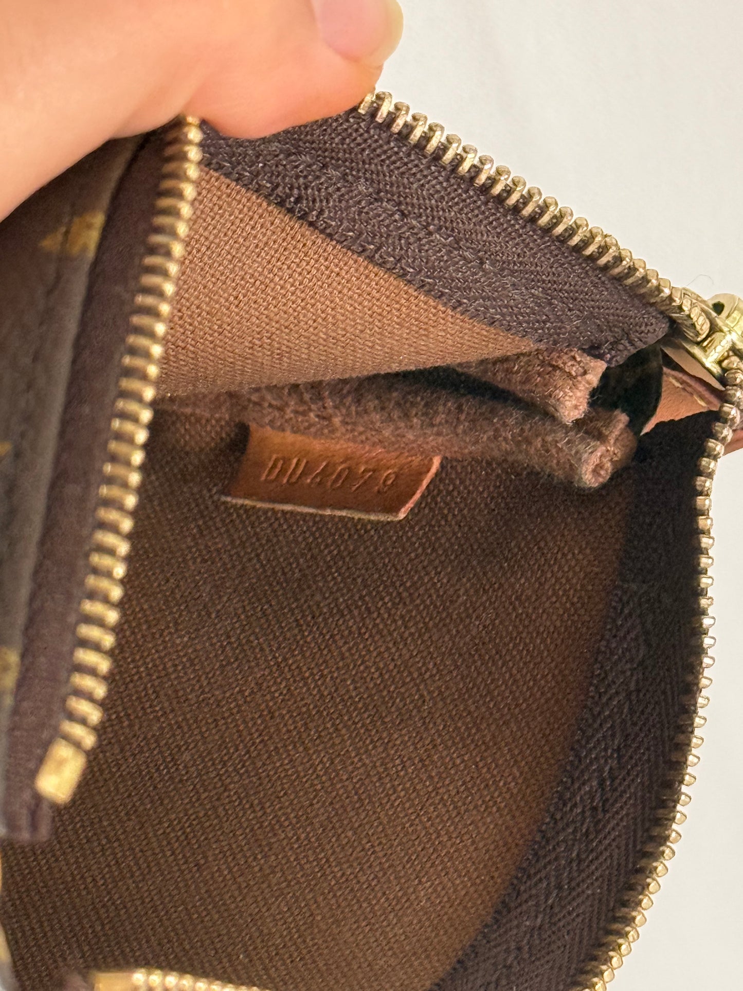 Louis Vuitton mini monogram accessory clutch bag