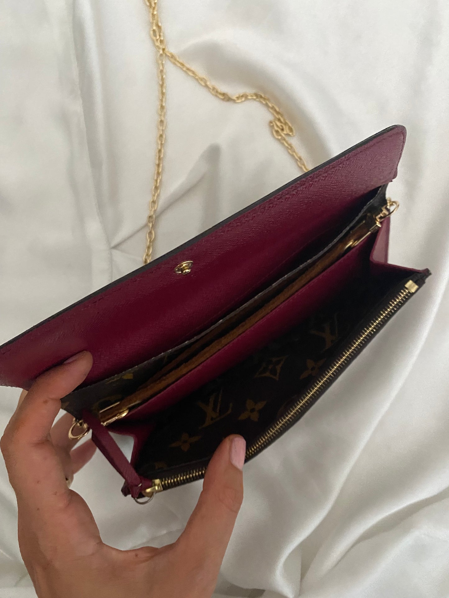 Louis Vuitton Emilie clutch bag with fuchsia interior
