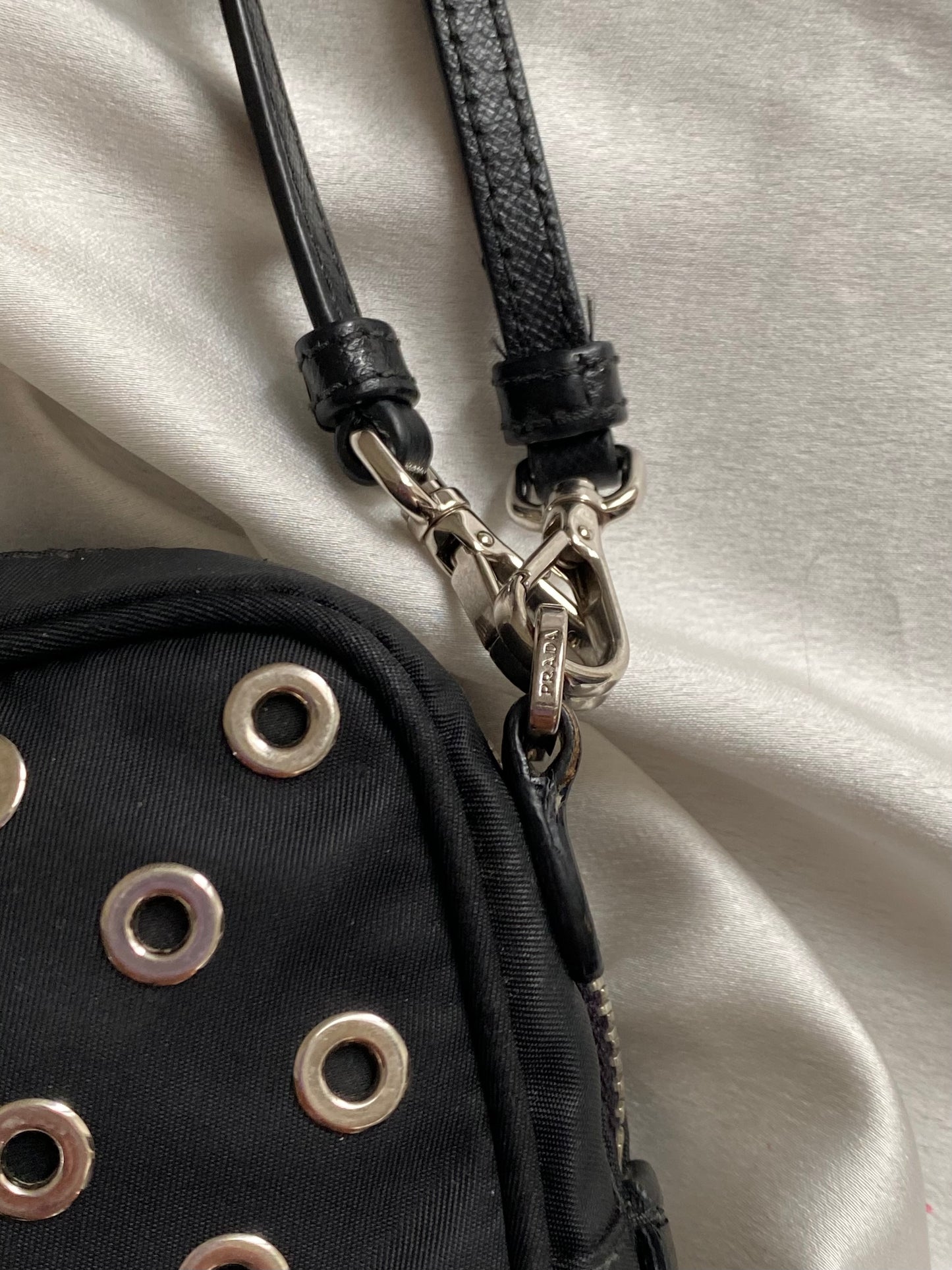 Prada mini grommet