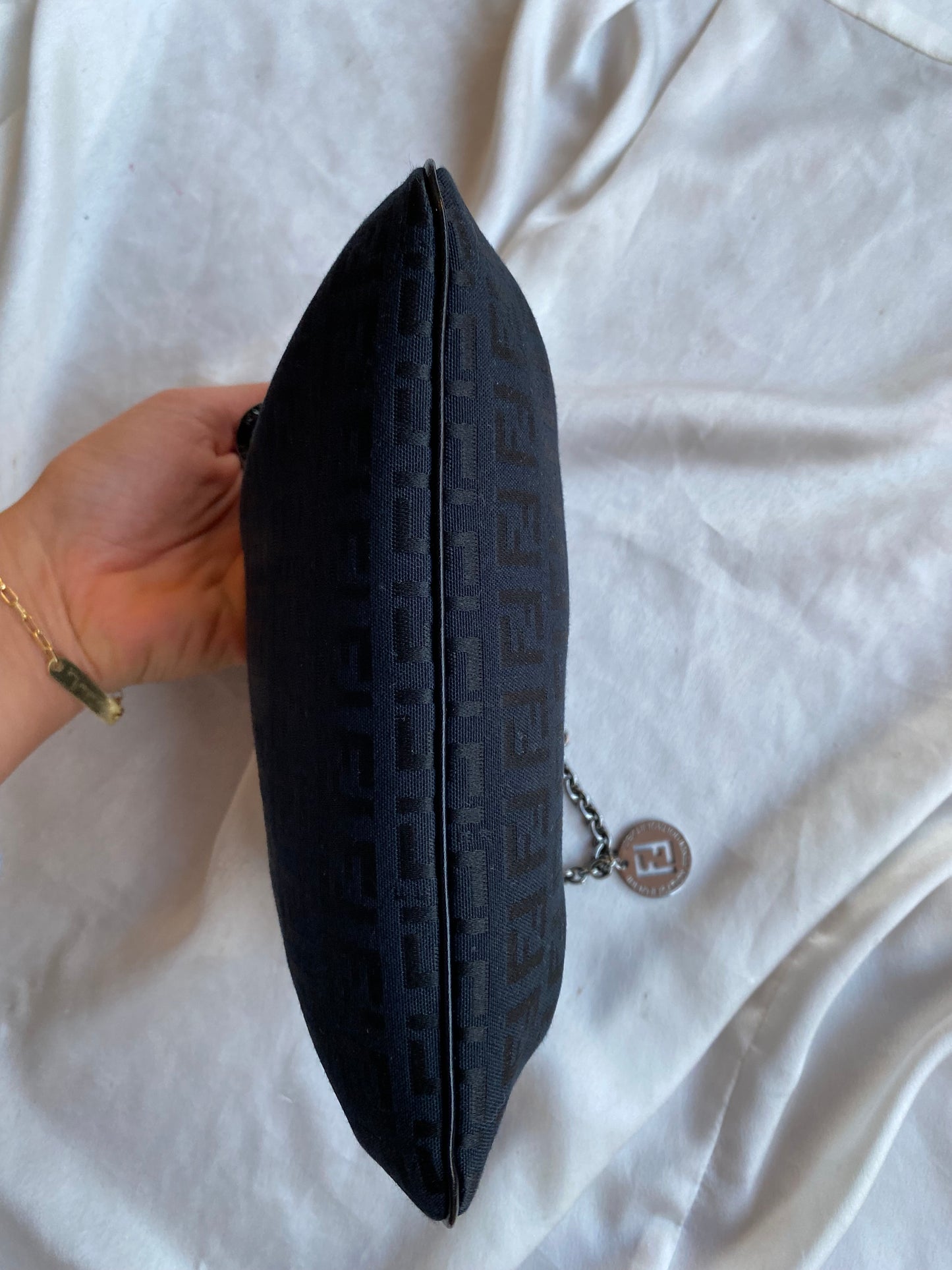Fendi clutch bag with silver monogram charms and zucchini