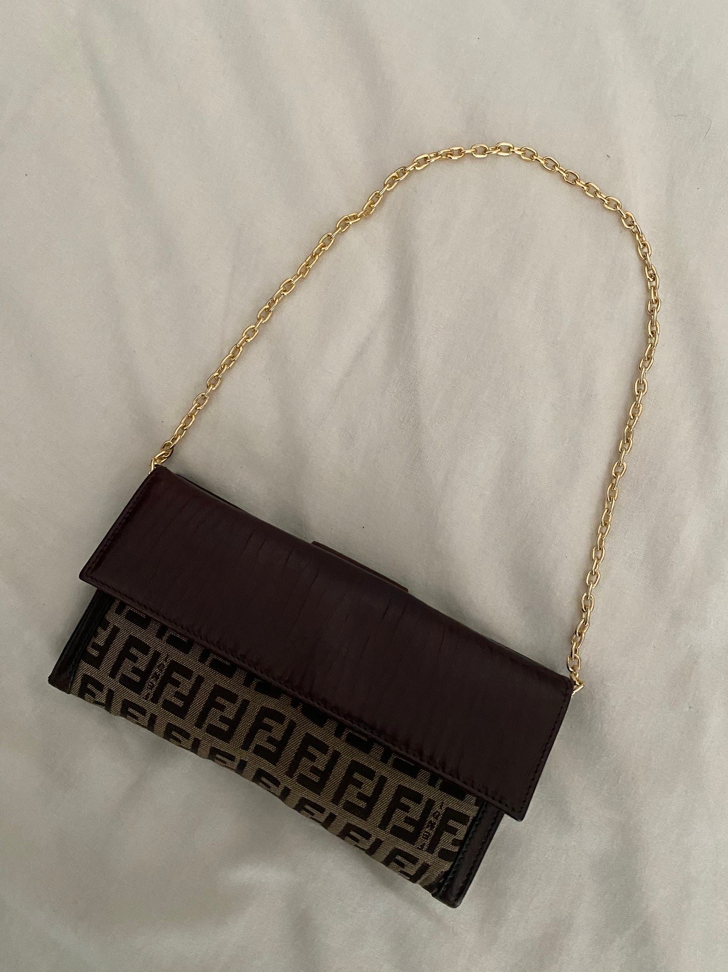 Fendi zucchini clutch bag with maxi logo