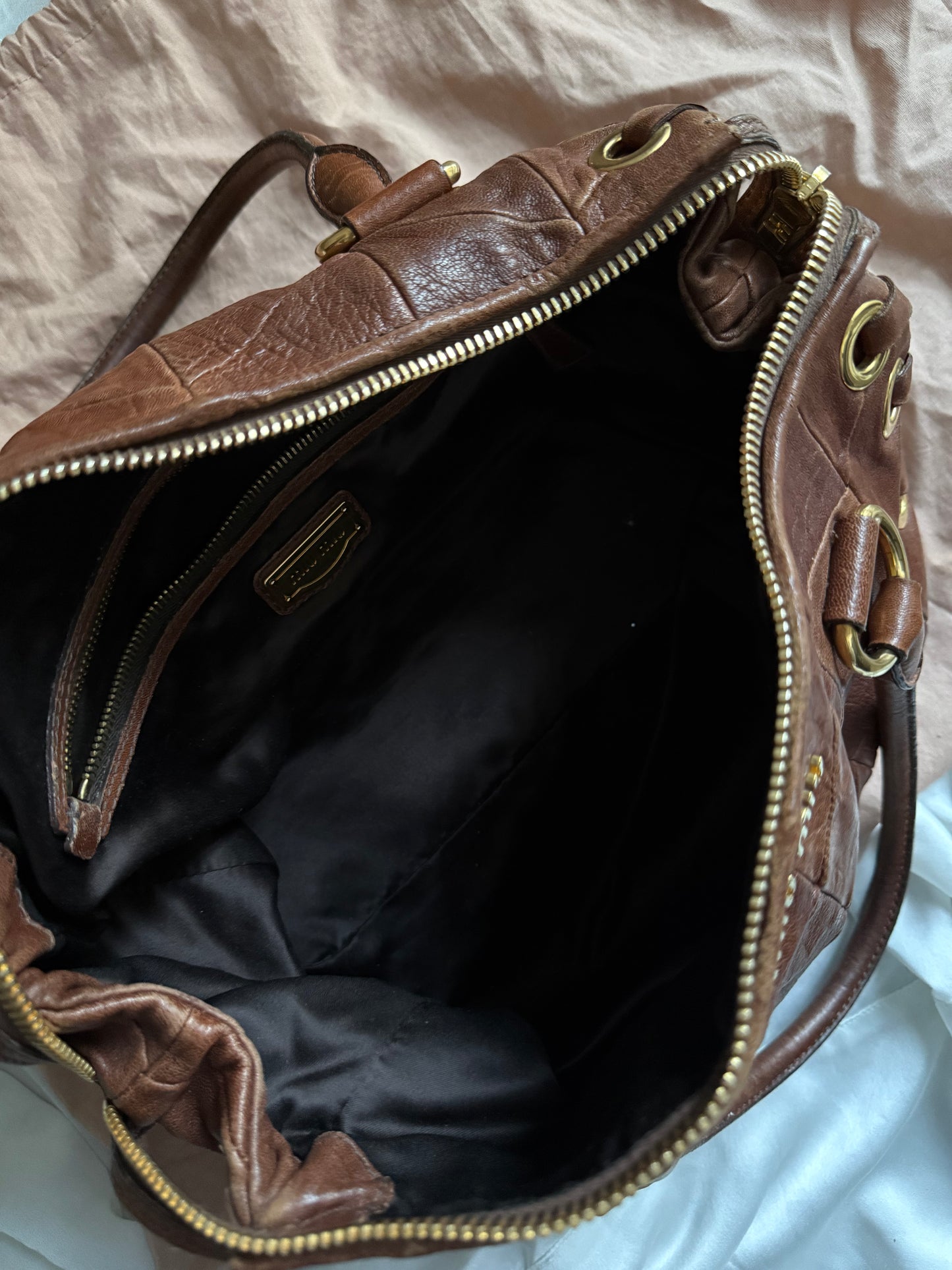 Miu miu grommet misura media