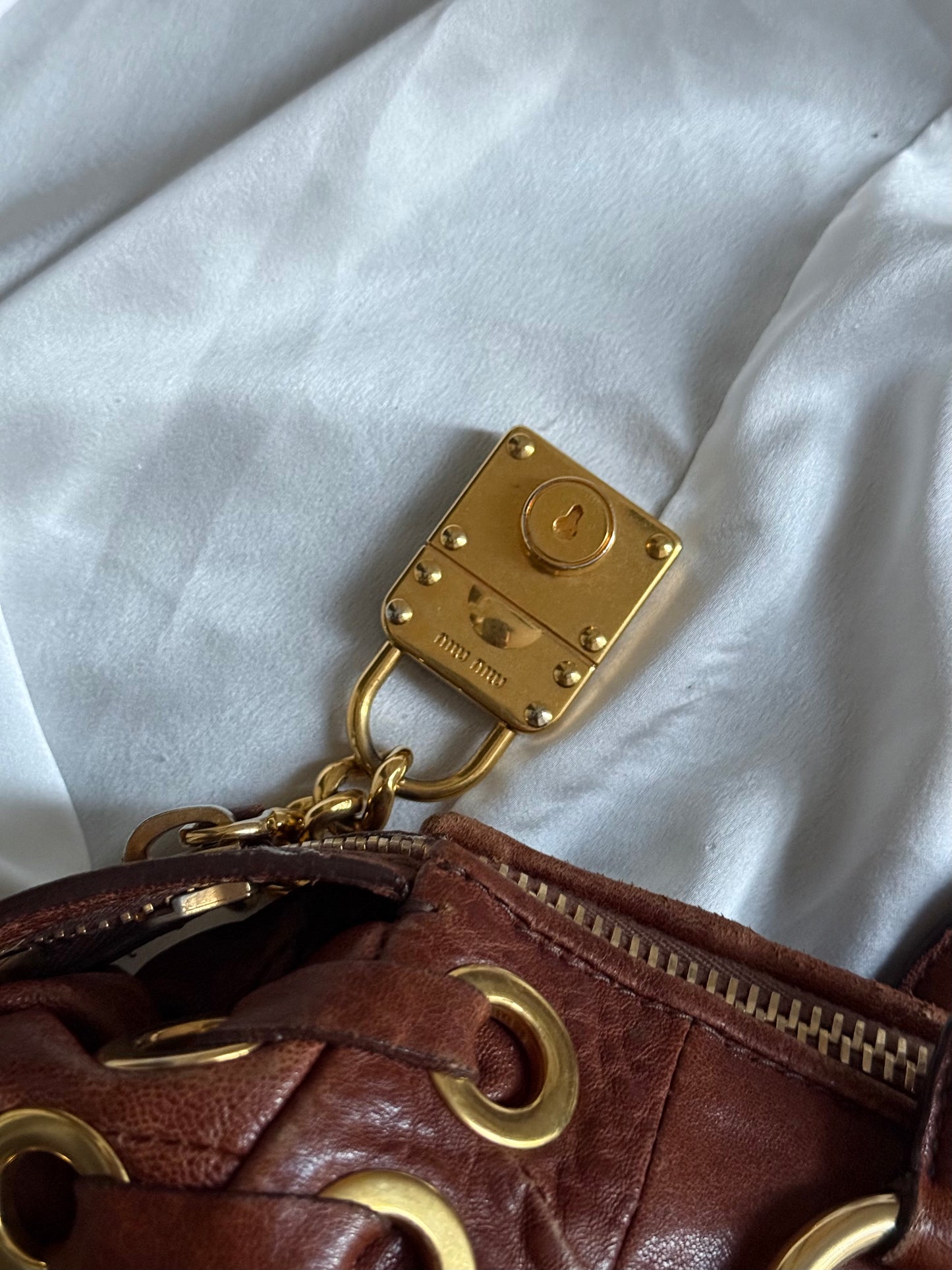 Miu miu grommet misura media