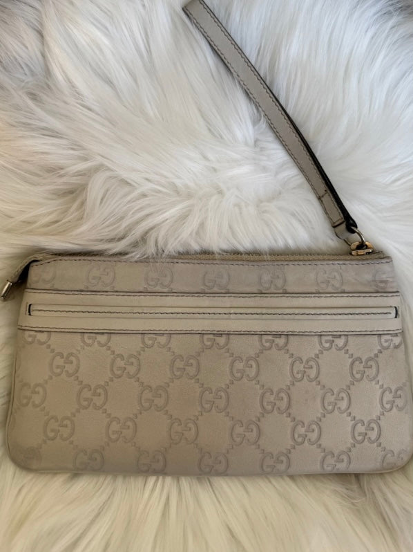 Gucci monogram cream leather clutch bag