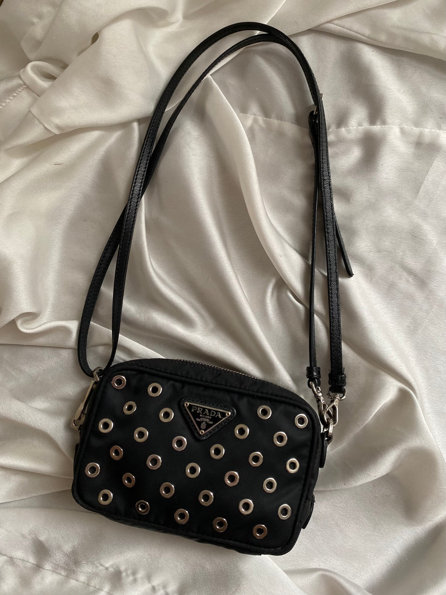 Prada mini grommet