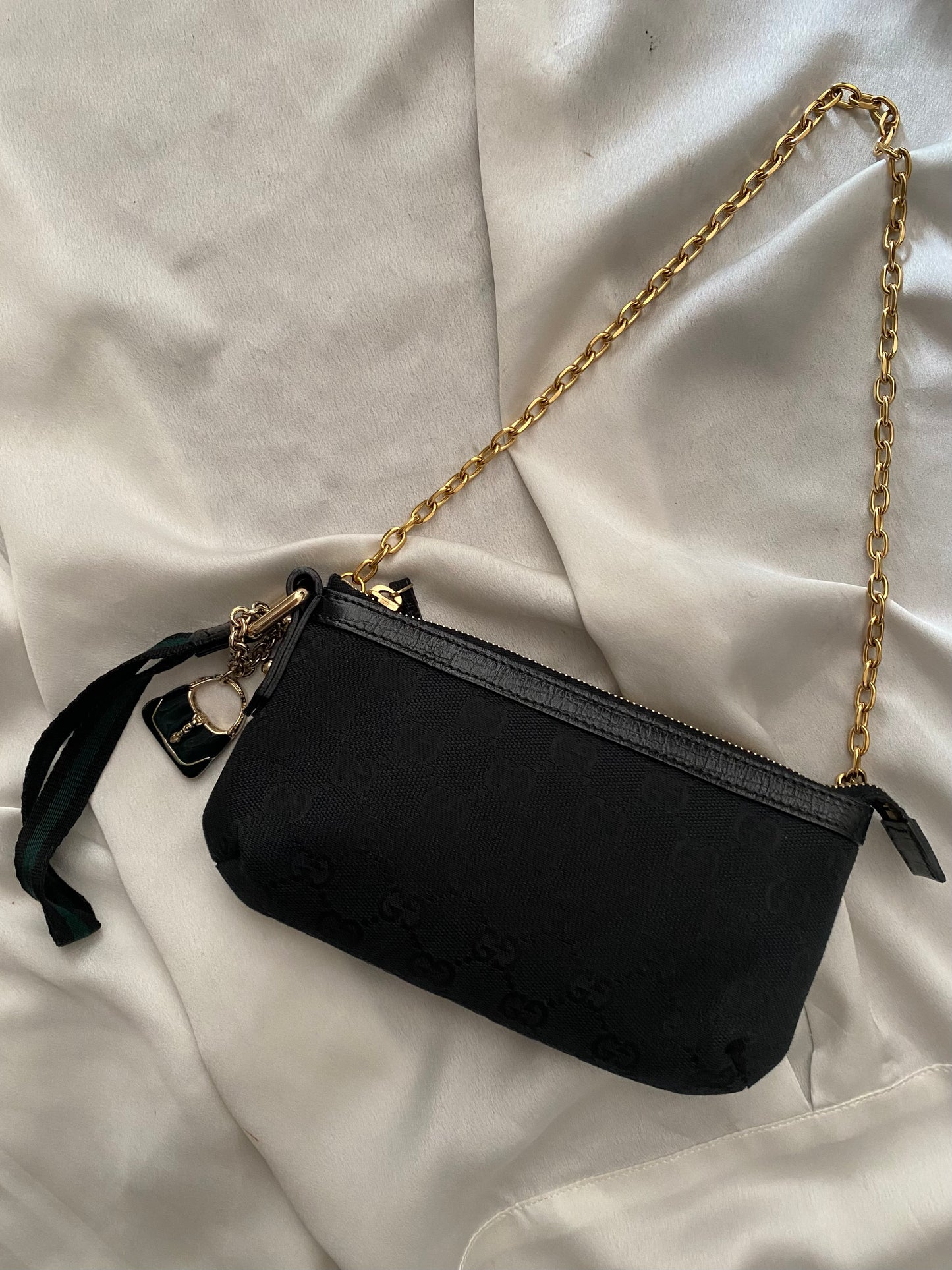 Gucci black monogram web clutch