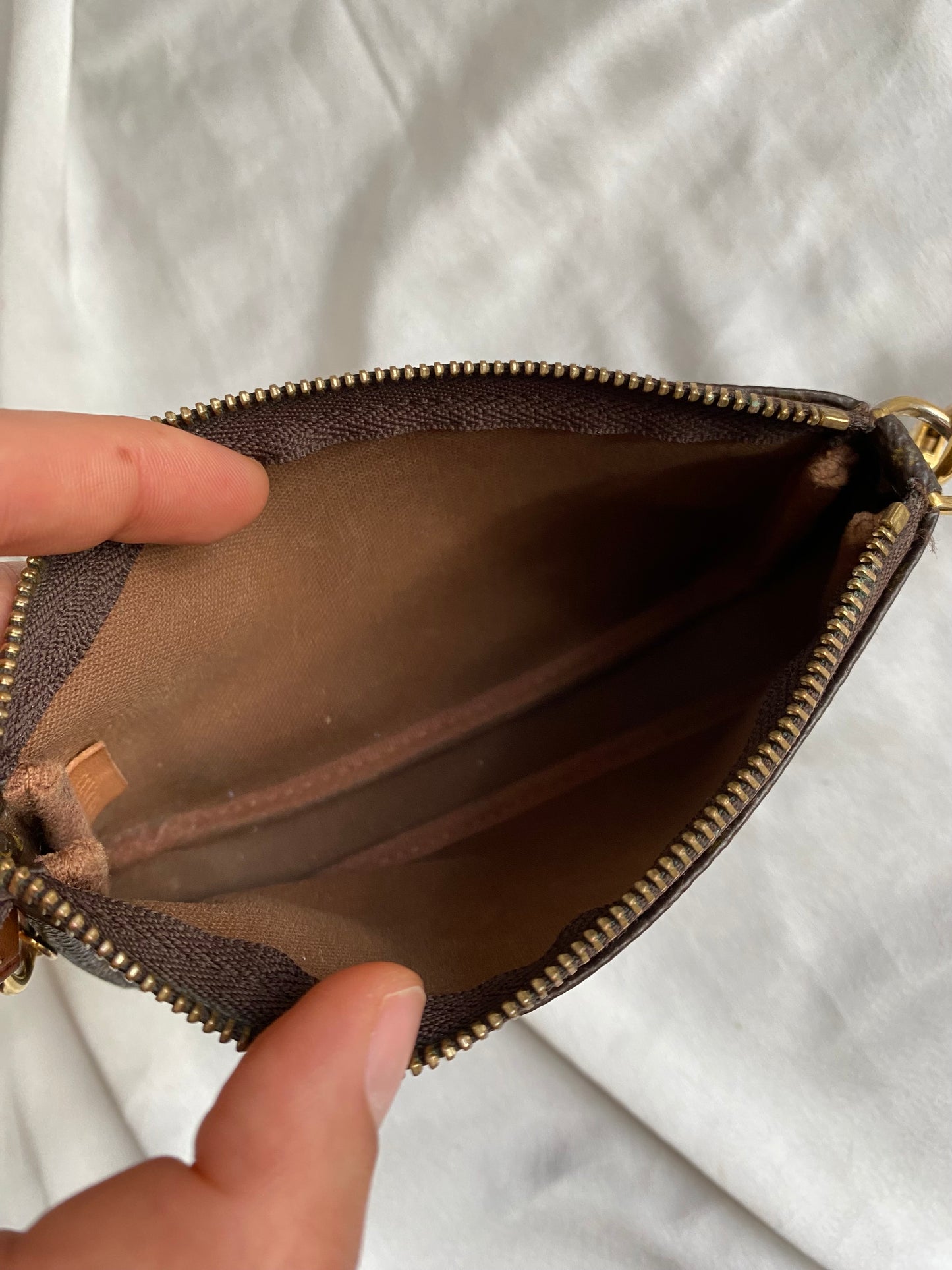 Louis Vuitton mini monogram accessory clutch bag