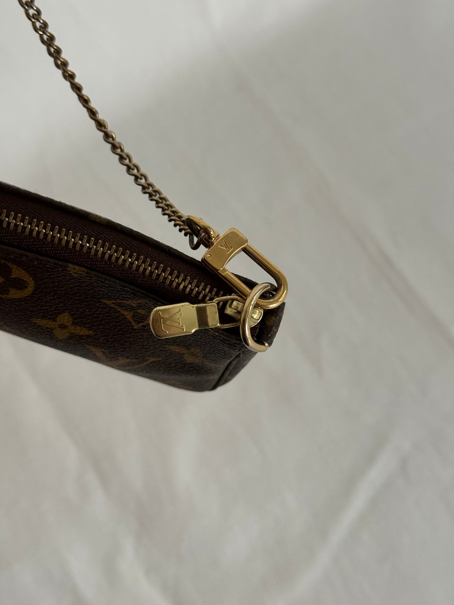 Louis Vuitton mini monogram accessory clutch bag