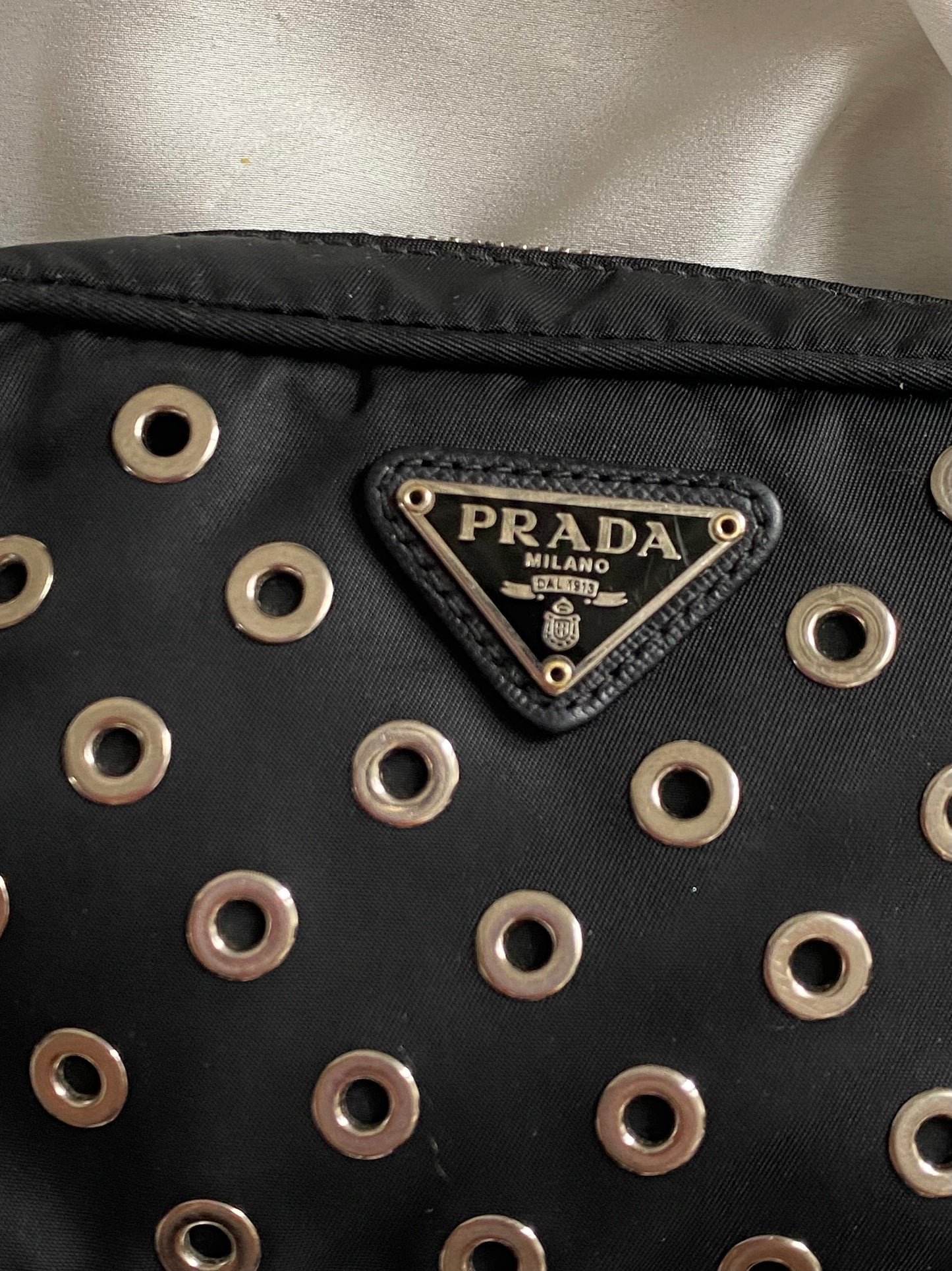 Prada mini grommet