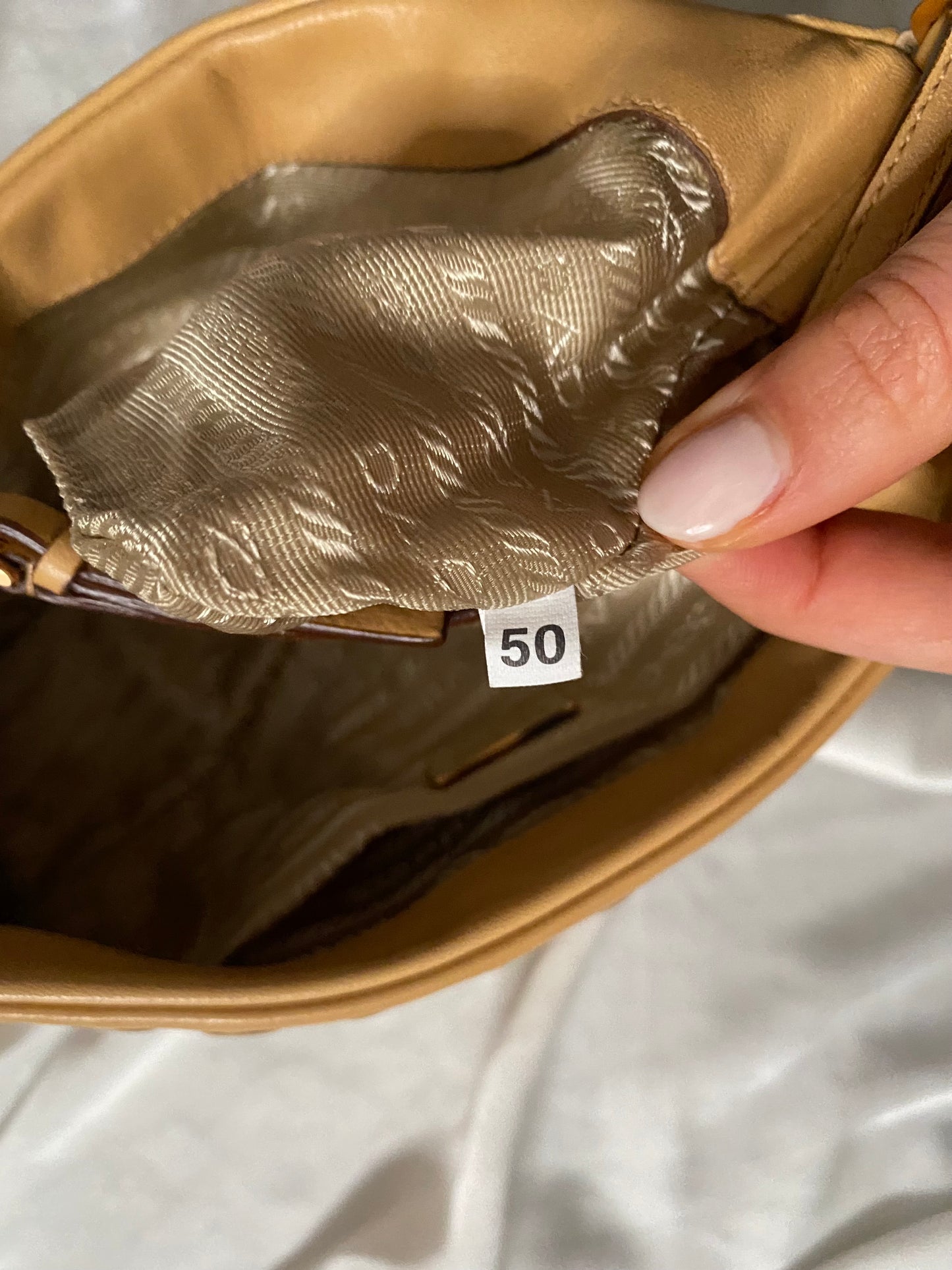 Prada camel clutch bag with studs