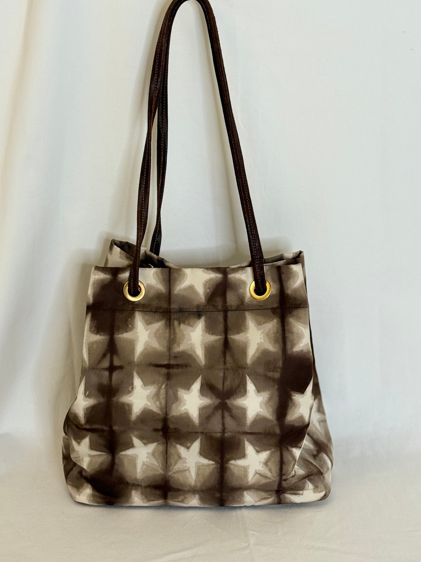 Prada shopping tote stars