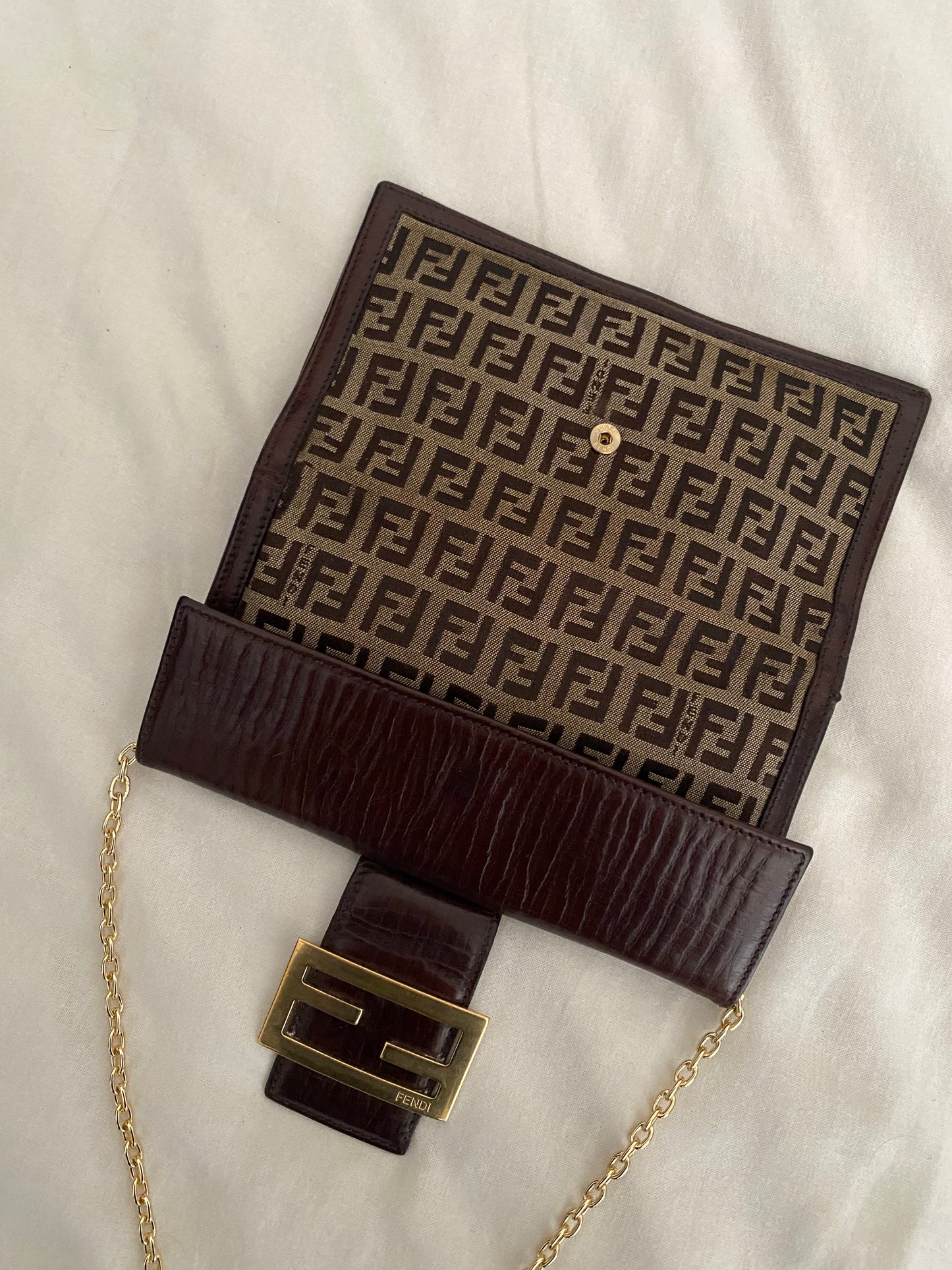 Fendi zucchini clutch bag with maxi logo