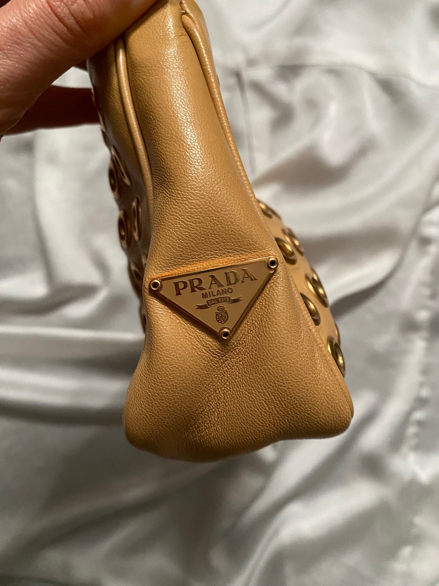 Prada camel clutch bag with studs