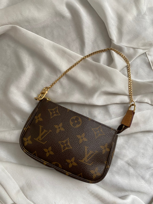 Louis Vuitton mini clutch accessoire classic monogram