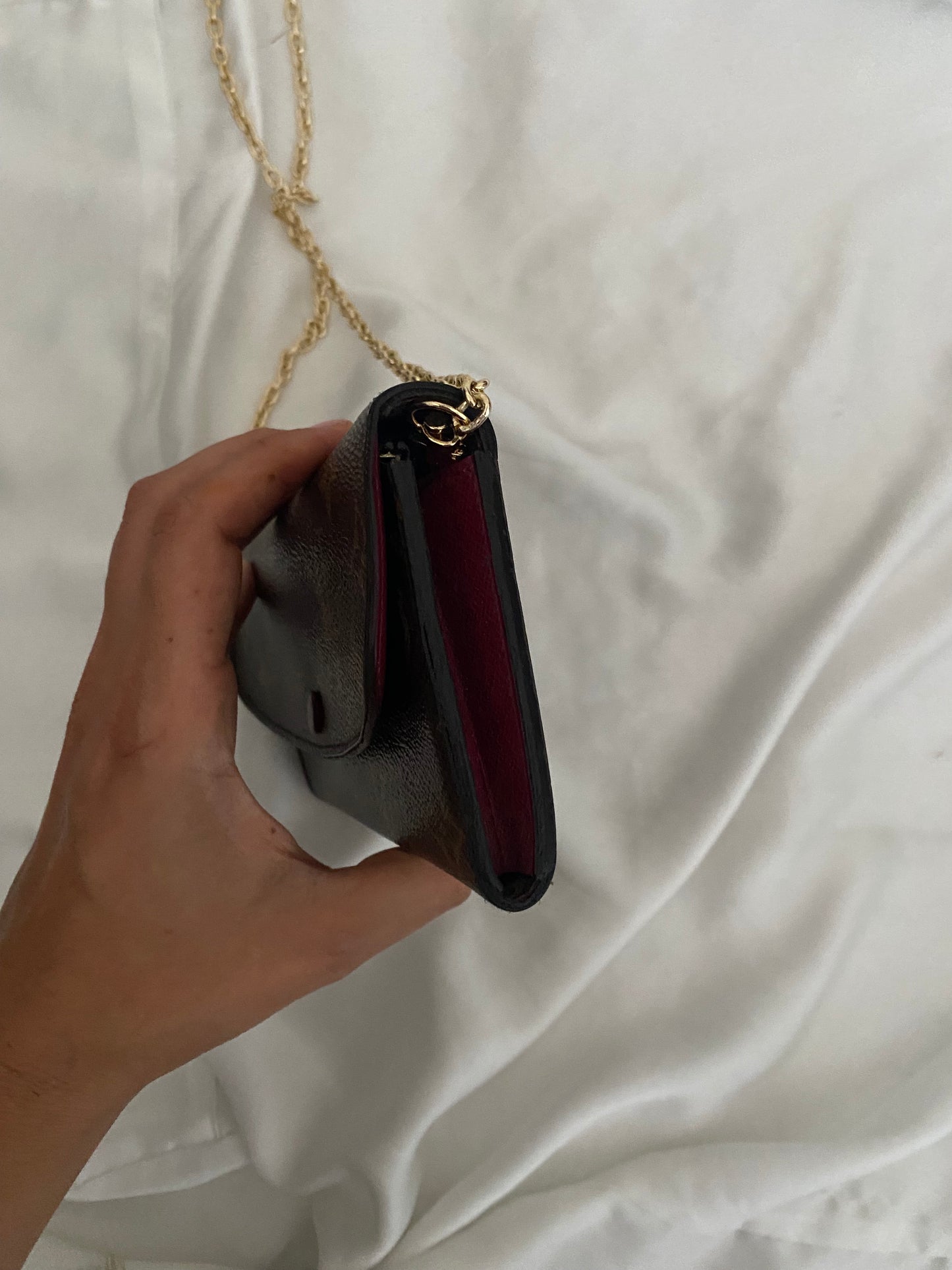 Louis Vuitton Emilie clutch bag with fuchsia interior