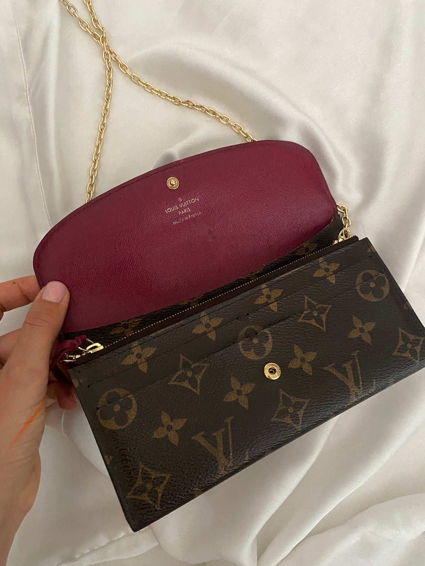 Louis Vuitton Emilie clutch bag with fuchsia interior