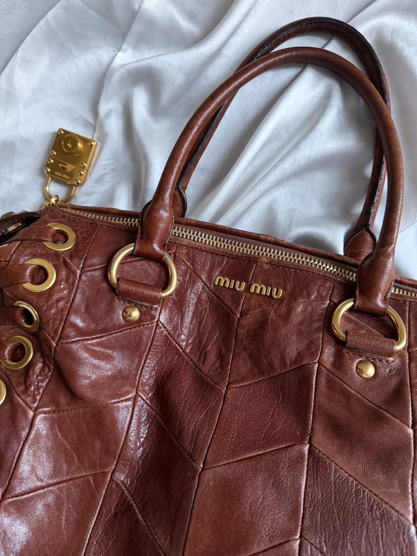 Miu miu grommet misura media