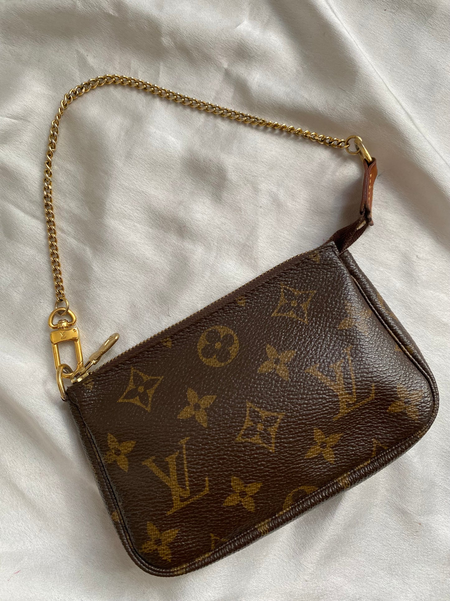 Louis Vuitton mini monogram accessory clutch bag
