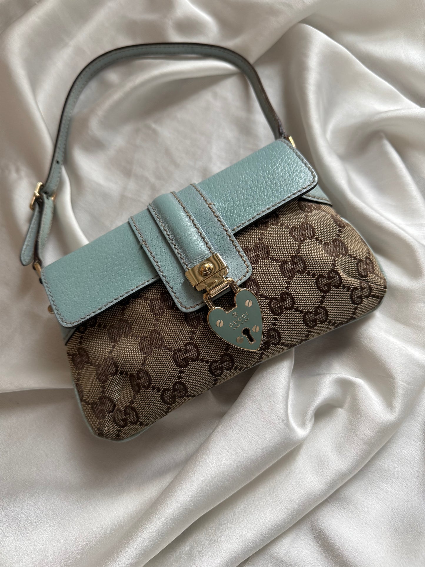 Gucci pochette monogram heartlock light blue