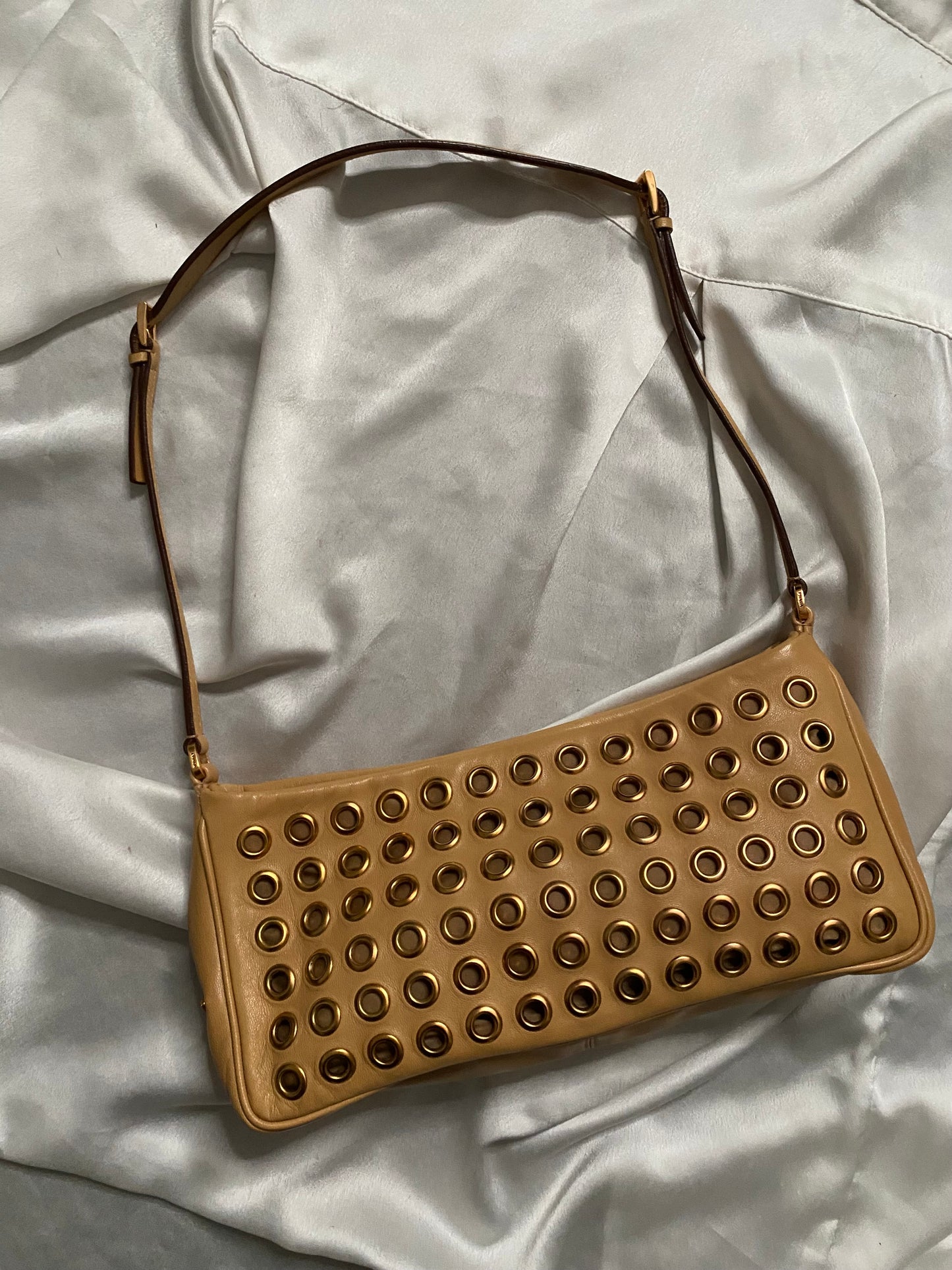 Prada camel clutch bag with studs