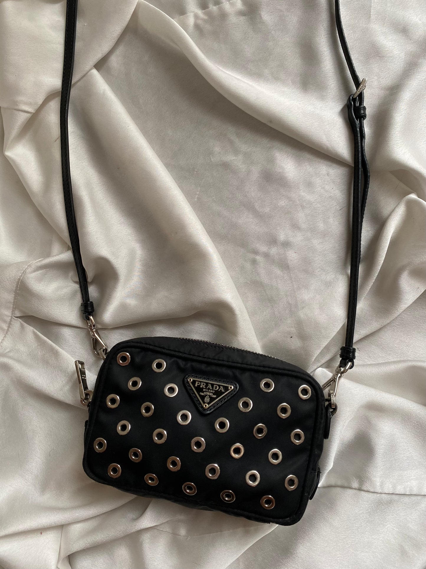 Prada mini grommet