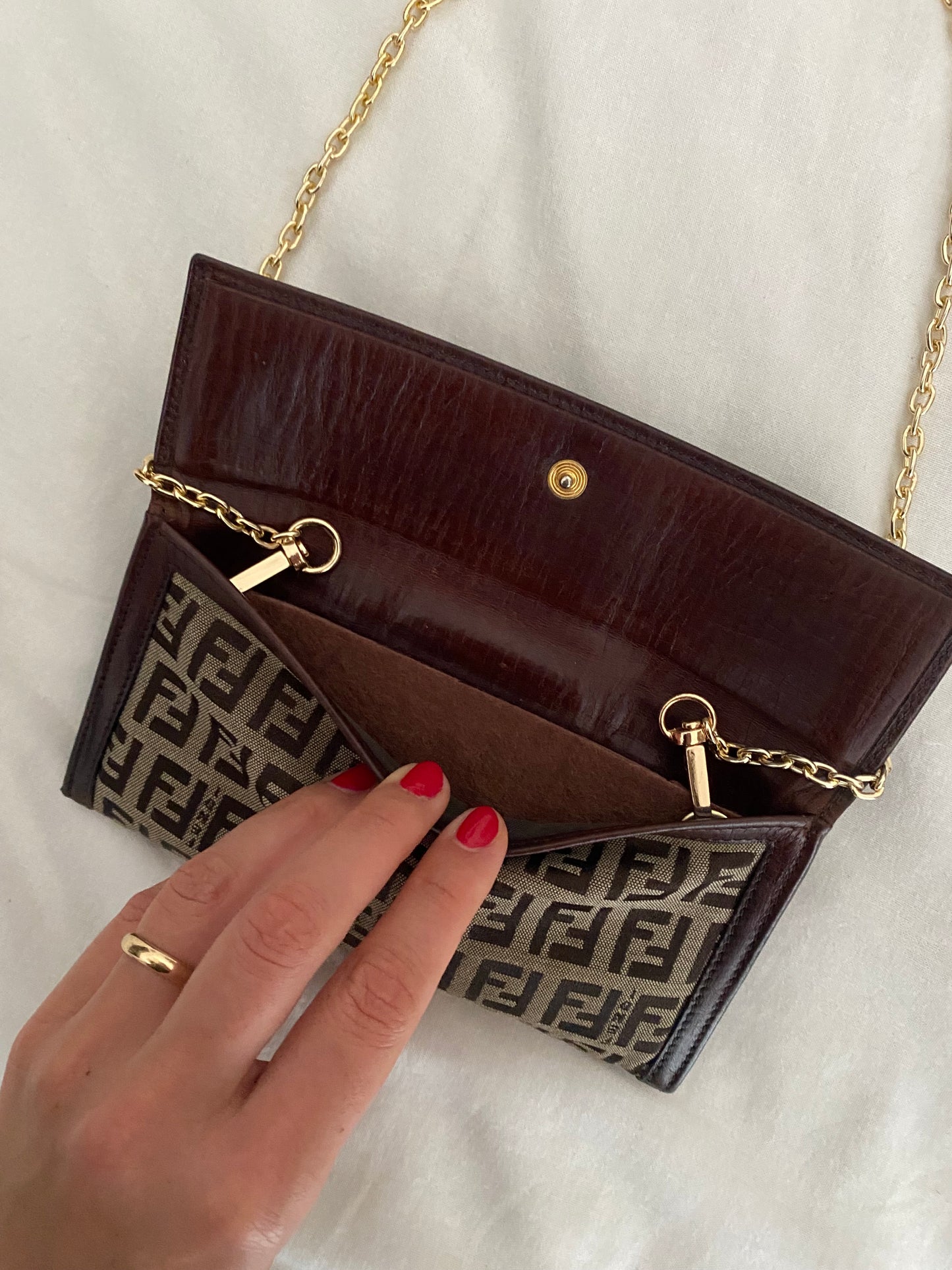 Fendi zucchini clutch bag with maxi logo