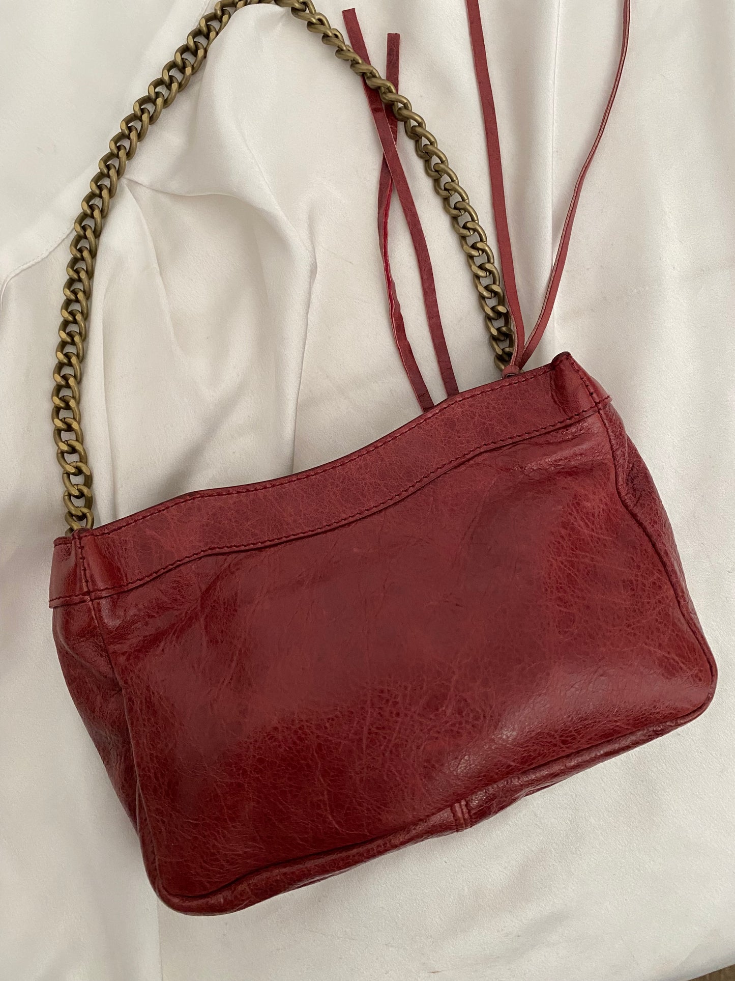 Balenciaga motocross burgundy clutch bag